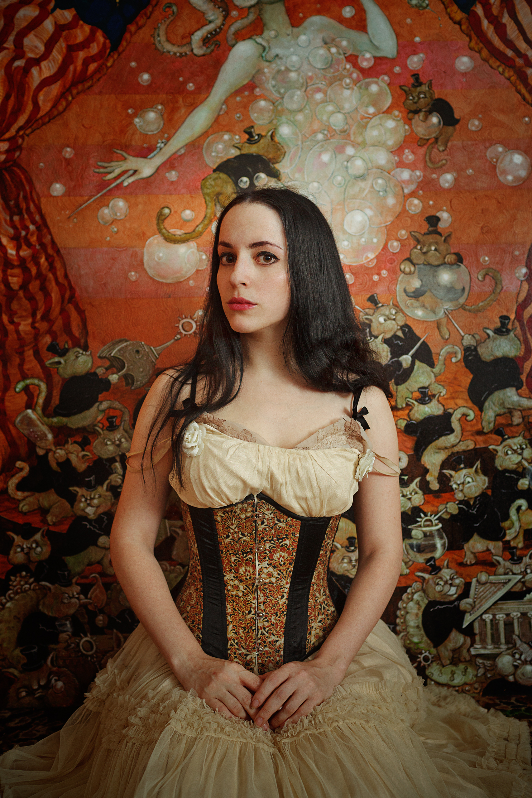 Molly Crabapple,  her posing in front of her Shell Game Series, 2012 (Bill Wadman)
