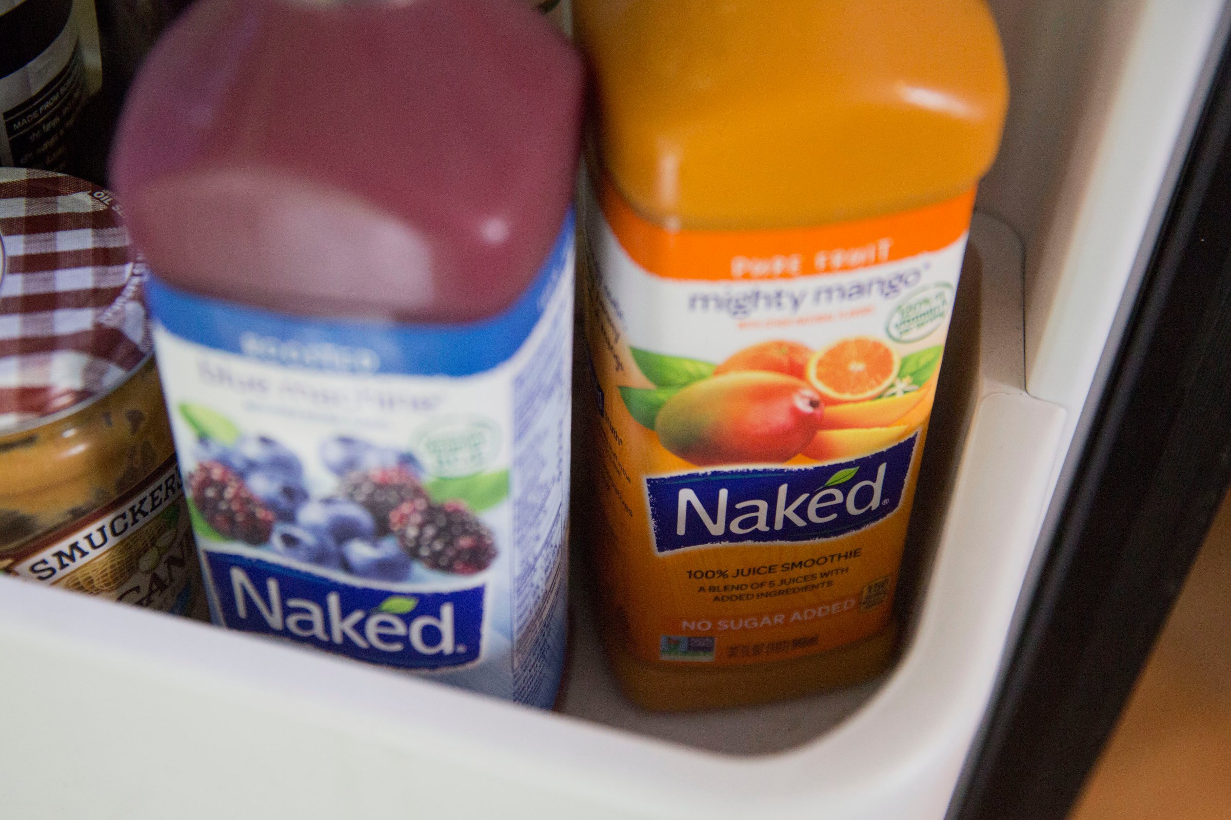 Bottles of PepsiCo Inc. Naked brand juice smoothies are arranged for a photograph in Tiskilwa, Illinois, U.S., on Thursday, July 2, 2015. PepsiCo Inc. is expected to report quarterly earnings on July 9, 2015.