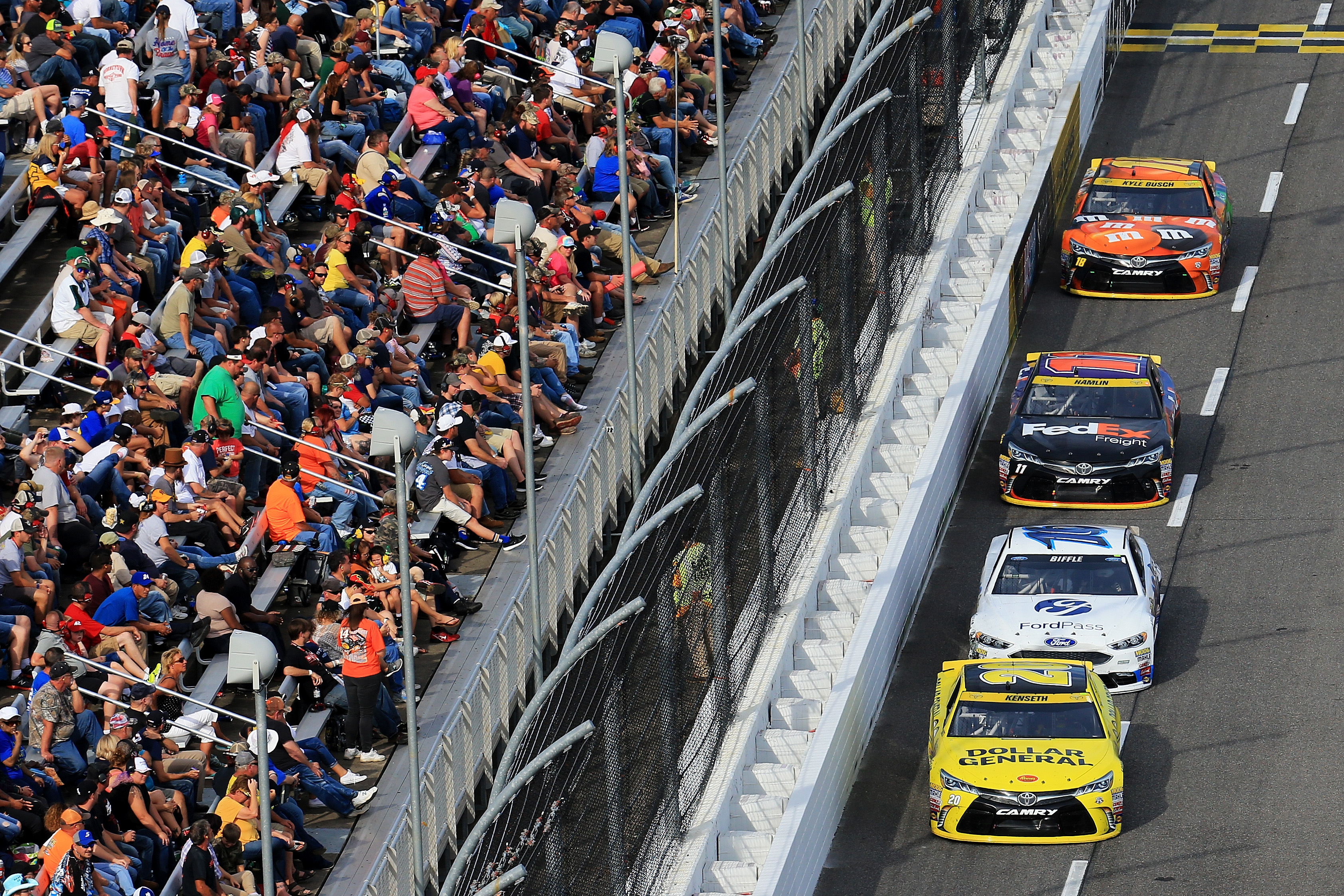 A pack of cars race during the NASCAR Sprint Cup Series Goody's Fast Relief 500 on October 30, 2016 in Martinsville, Virginia. (Daniel Shirey&mdash;Getty Images)
