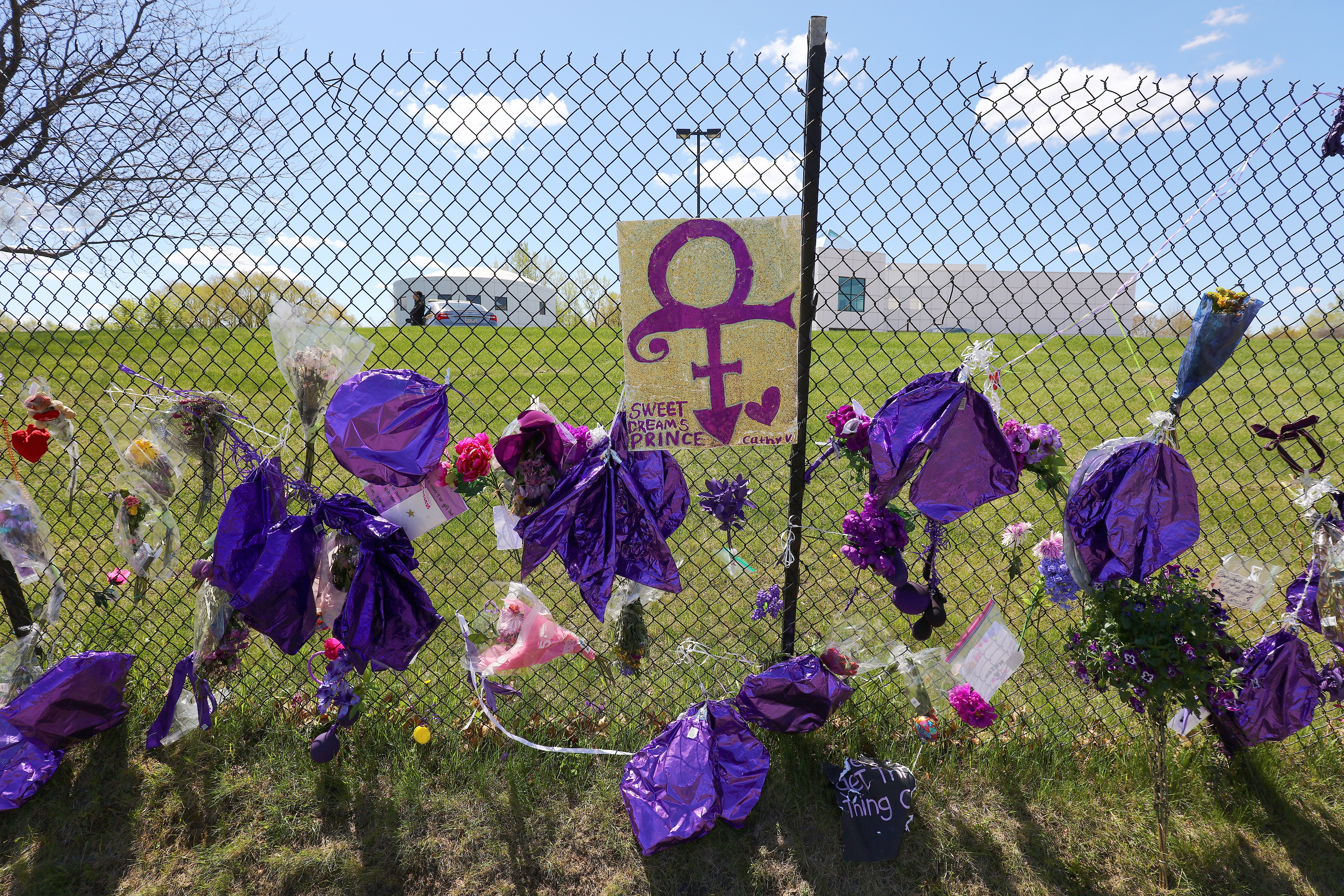 Tributes and memorials dedicated to Prince on the fence that surrounds Paisley Park on May 2, 2016 in Chaska, Minnesota. (Adam Bettcher&mdash;Getty Images)