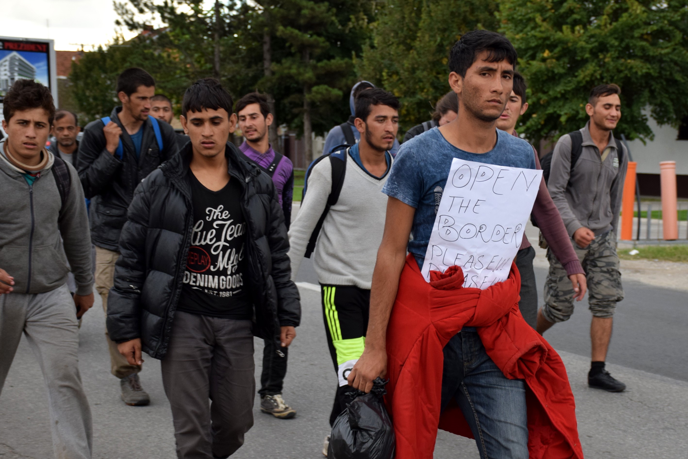 Refugees make their way to Hungarian border with Serbia near the town of Horgos in Belgrade, Serbia on Oct. 4, 2016.