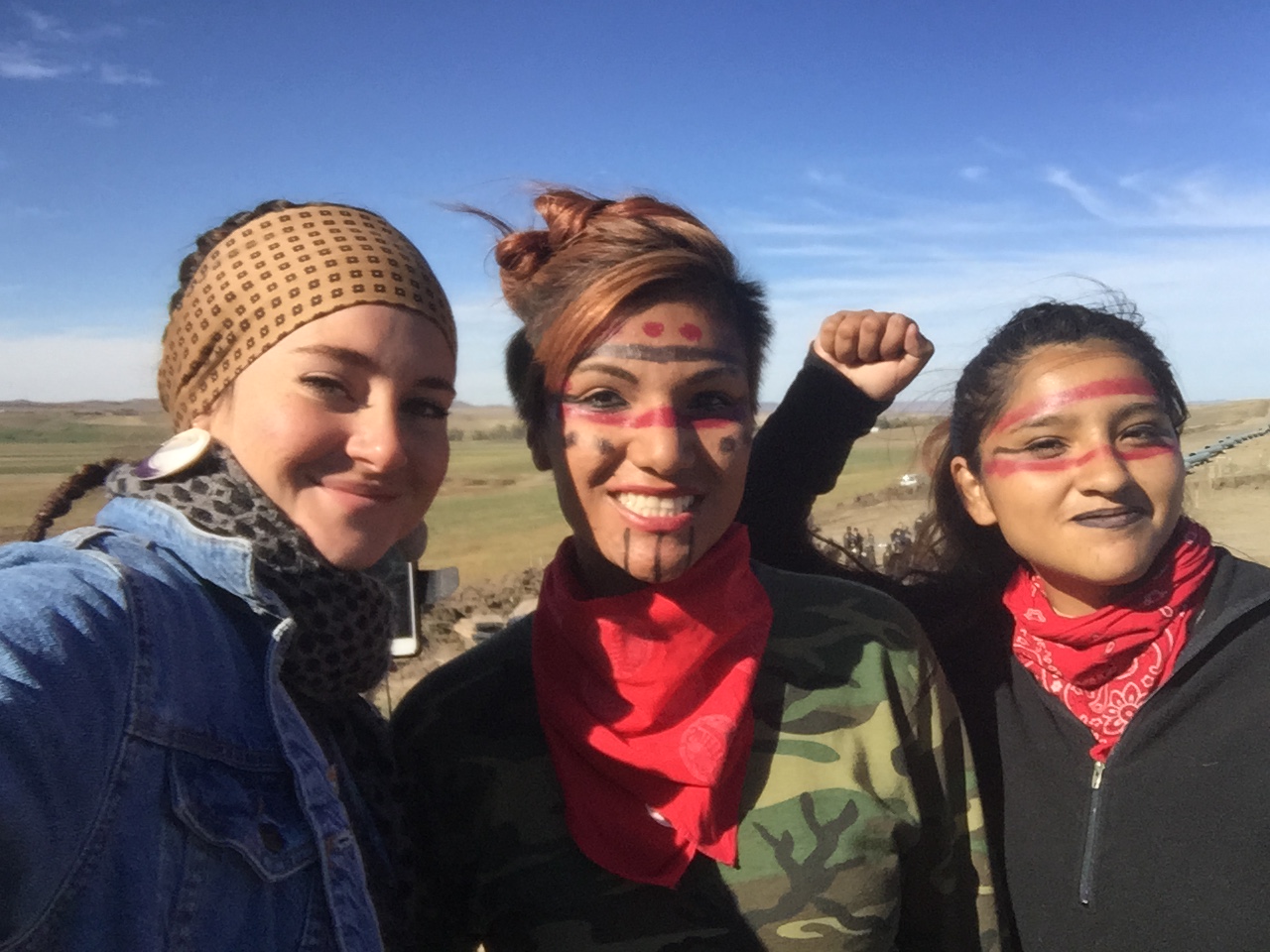 Actress Shailene Woodley (left) standing with two other people protesting the North Dakota Access Pipeline on Oct. 10, 2016. (Shailene Woodley)