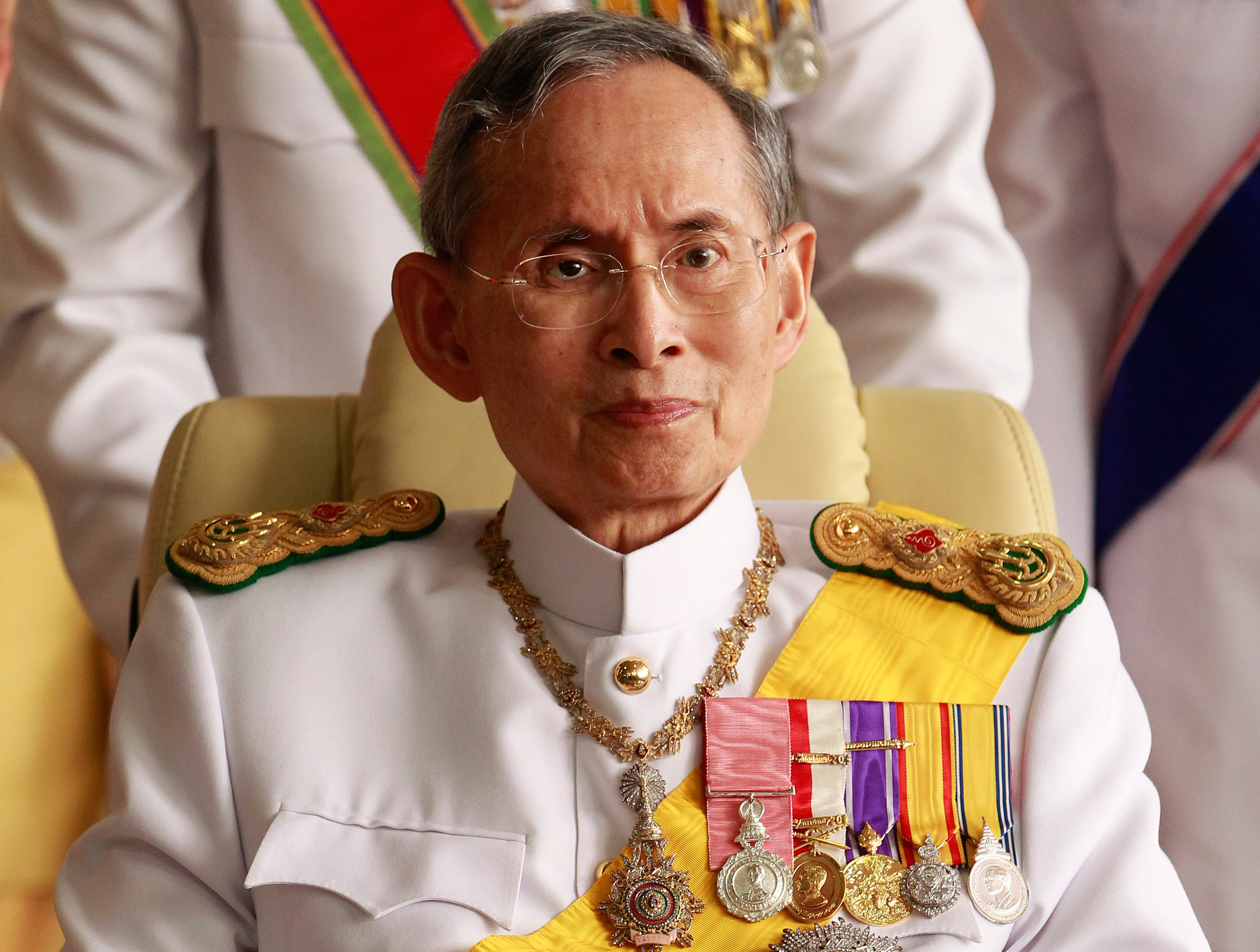 Thailand's King Bhumibol Adulyadej leaves the Siriraj Hospital for a ceremony at the Grand Palace in Bangkok