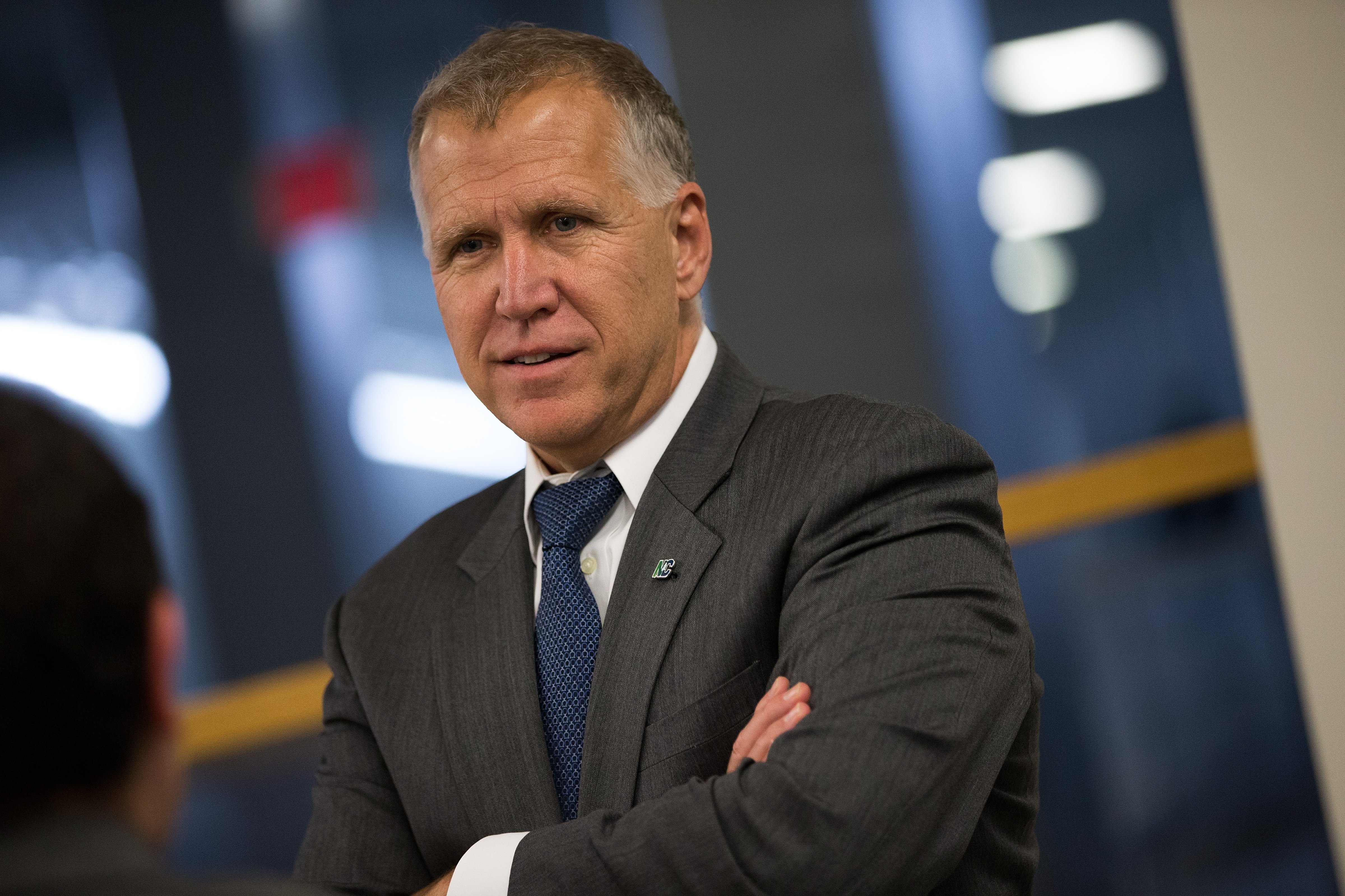 Sen. Thom Tillis speaks with an aide after a vote at the U.S. Capitol in Washington, D.C., on May 9, 2016.