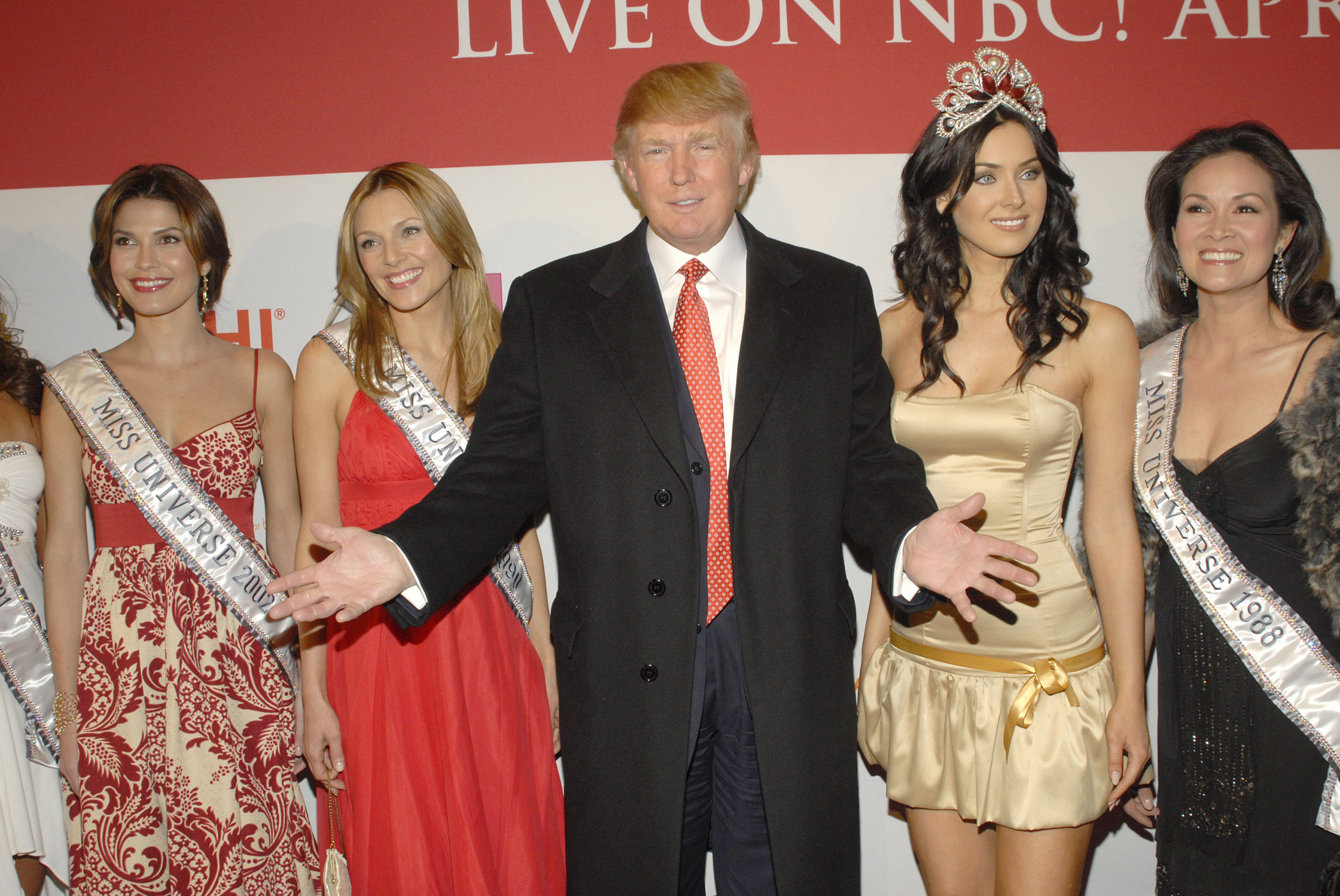 Donald Trump with former Miss Universes and the 2006 current Miss Universe, Natalie Glebova, April 18, 2006. (G. Gershoff—WireImage/Getty Images)