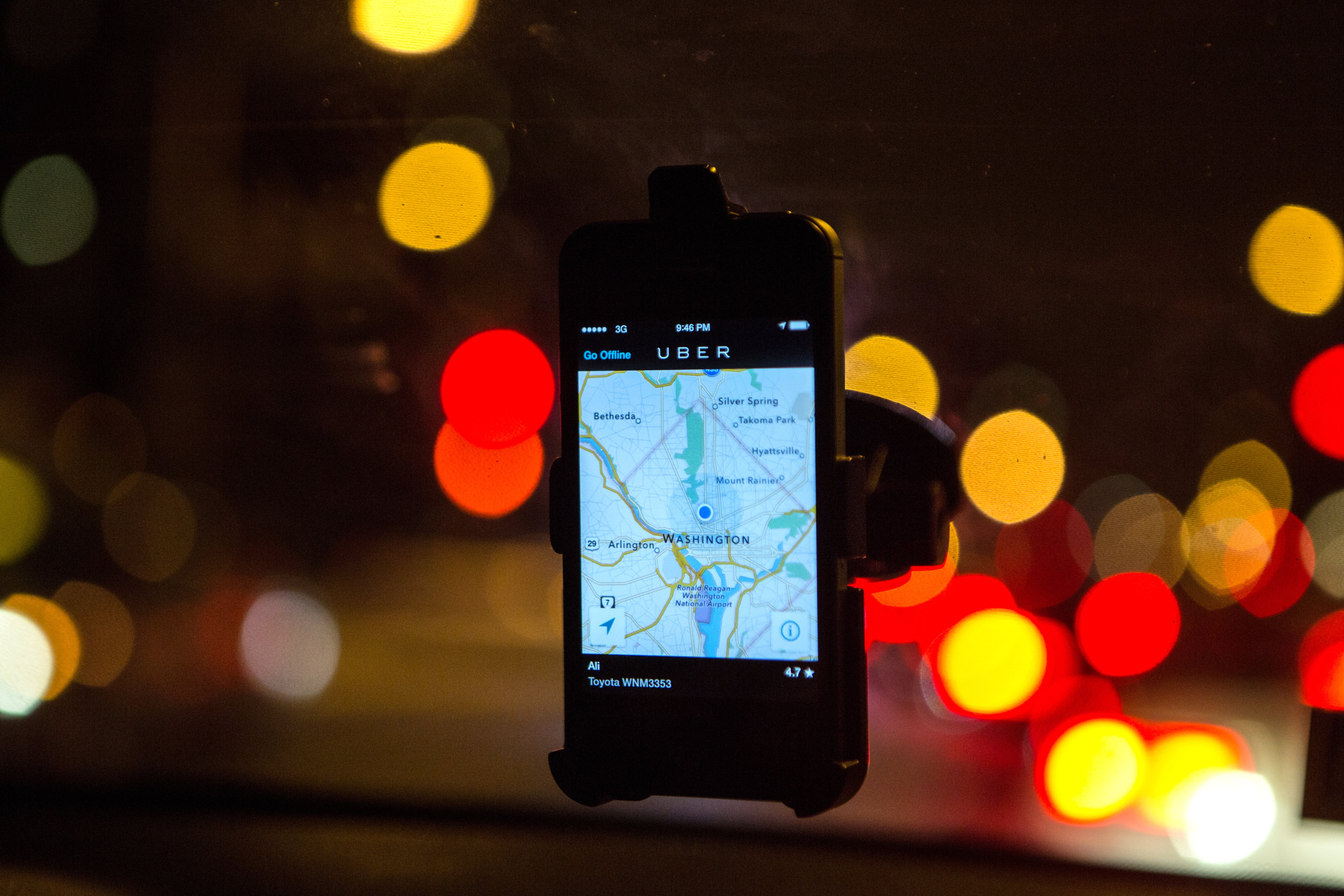 The Uber driver app on a windshield. (The Washington Post—The Washington Post/Getty Images)