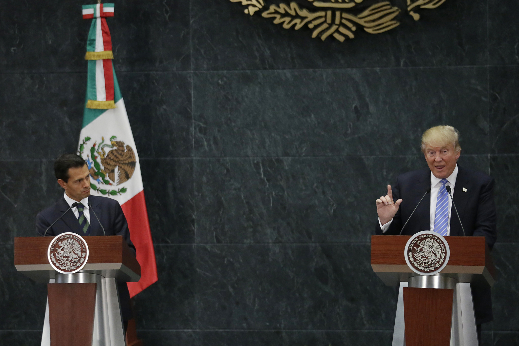 U.S. Republican presidential nominee Donald Trump and Mexico's President Enrique Pena Nieto give a press conference in Mexico City in August. (Henry Romero-Reuters)