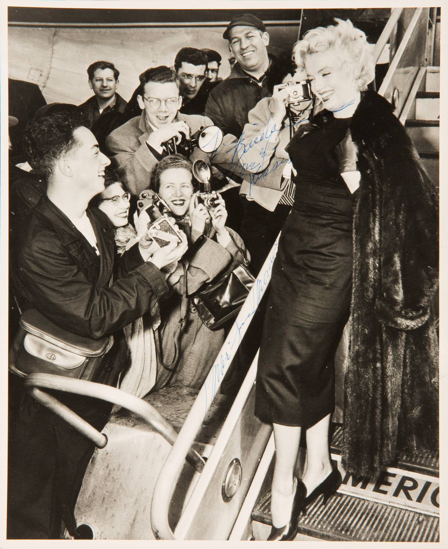 Marilyn Monroe as she boarded a plane for Hollywood at Idlewild Airport in New York on February 25, 1956.