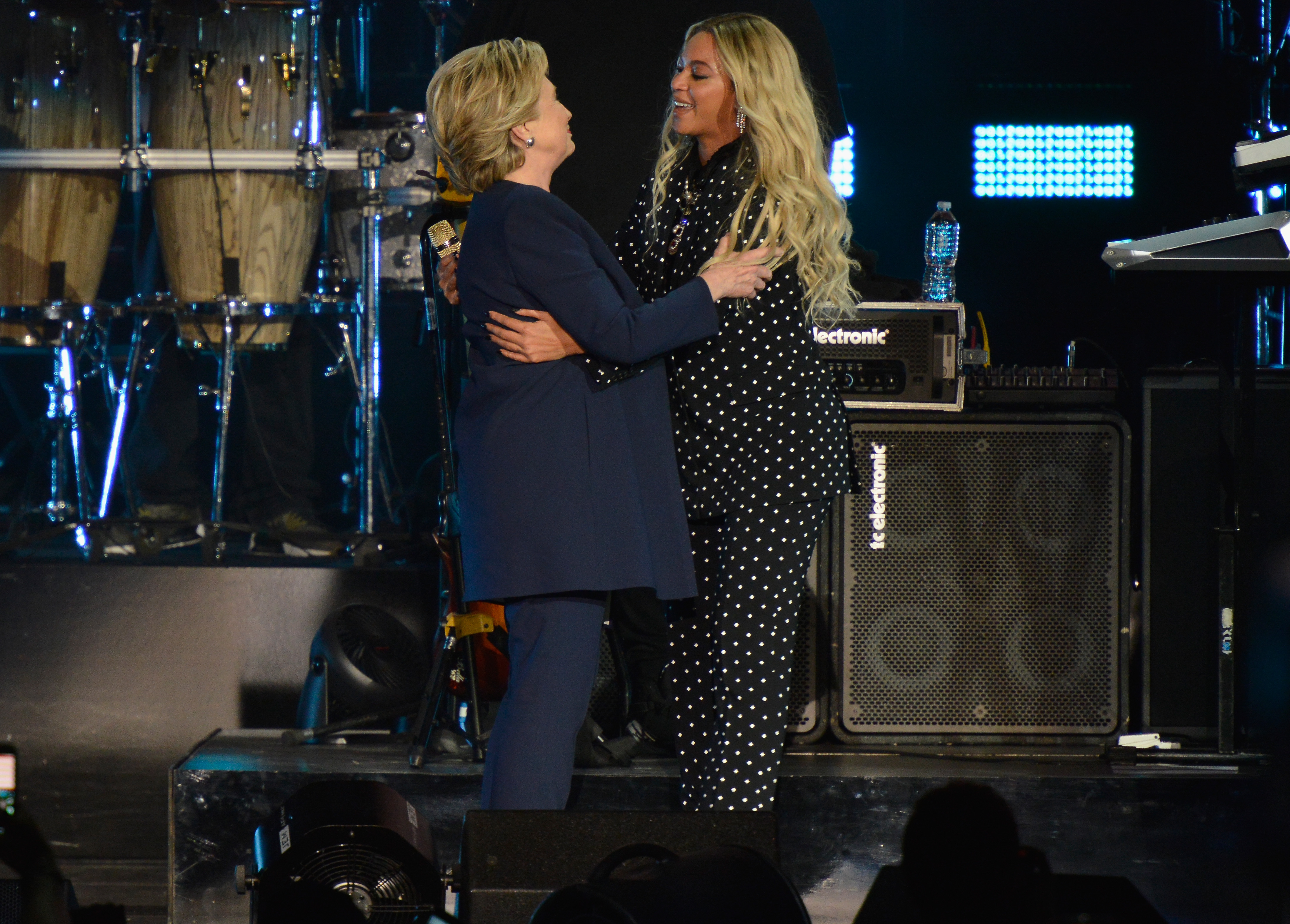 Beyoncé welcomes on stage Democratic presidential nominee former Secretary of State Hillary Clinton during a Get Out The Vote concert at Wolstein Center in Cleveland, Ohio on Nov. 4, 2016. (Duane Prokop/Getty Images)