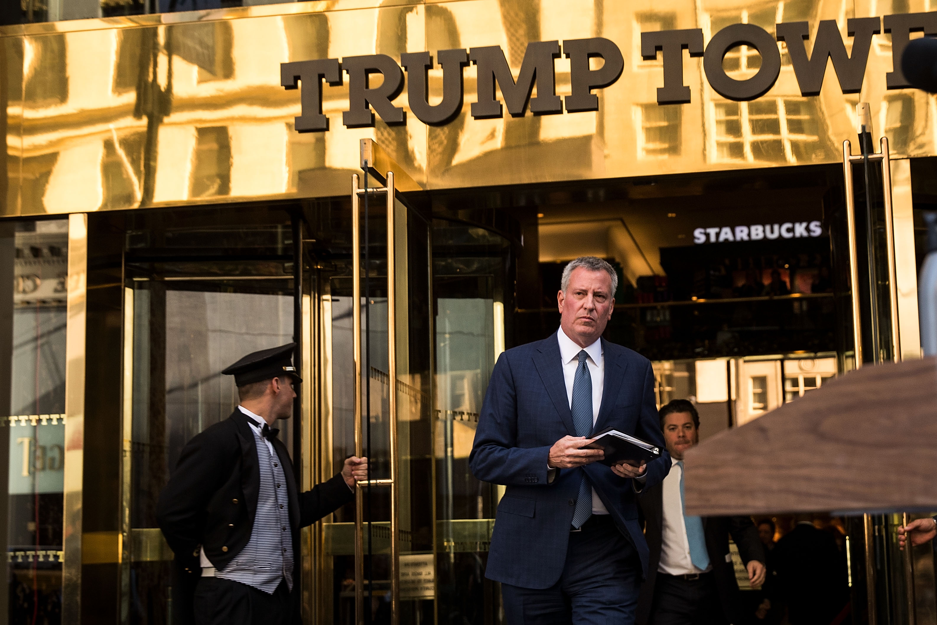 New York City mayor Bill de Blasio walks out of Trump Tower to speak to the press after his meeting with president-elect Donald Trump in New York City on Nov. 16, 2016. (Drew Angerer—Getty Images)