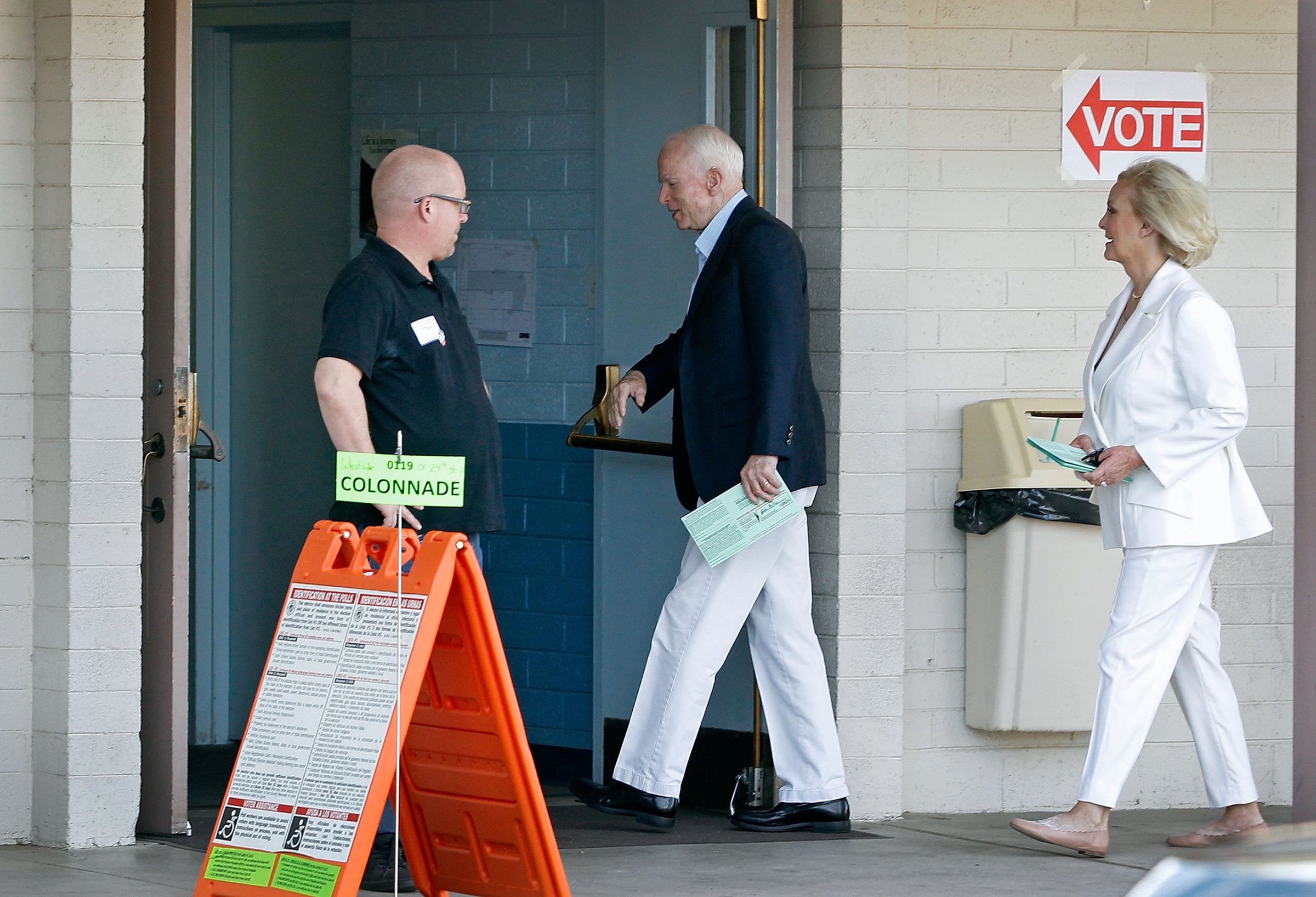 Republican Senator John McCain and his wife Cindy arrive at the Mountain View Christian Church polling place to cast their vote in Phoenix on Nov. 8, 2016.