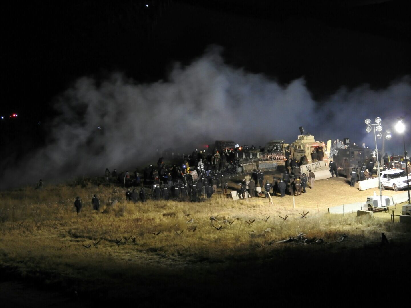 In this image provided by Morton County Sheriff’s Department, law enforcement and protesters clash near the site of the Dakota Access pipeline on Nov. 20, 2016, in Cannon Ball, N.D. (Morton County Sheriff’s Department/AP)