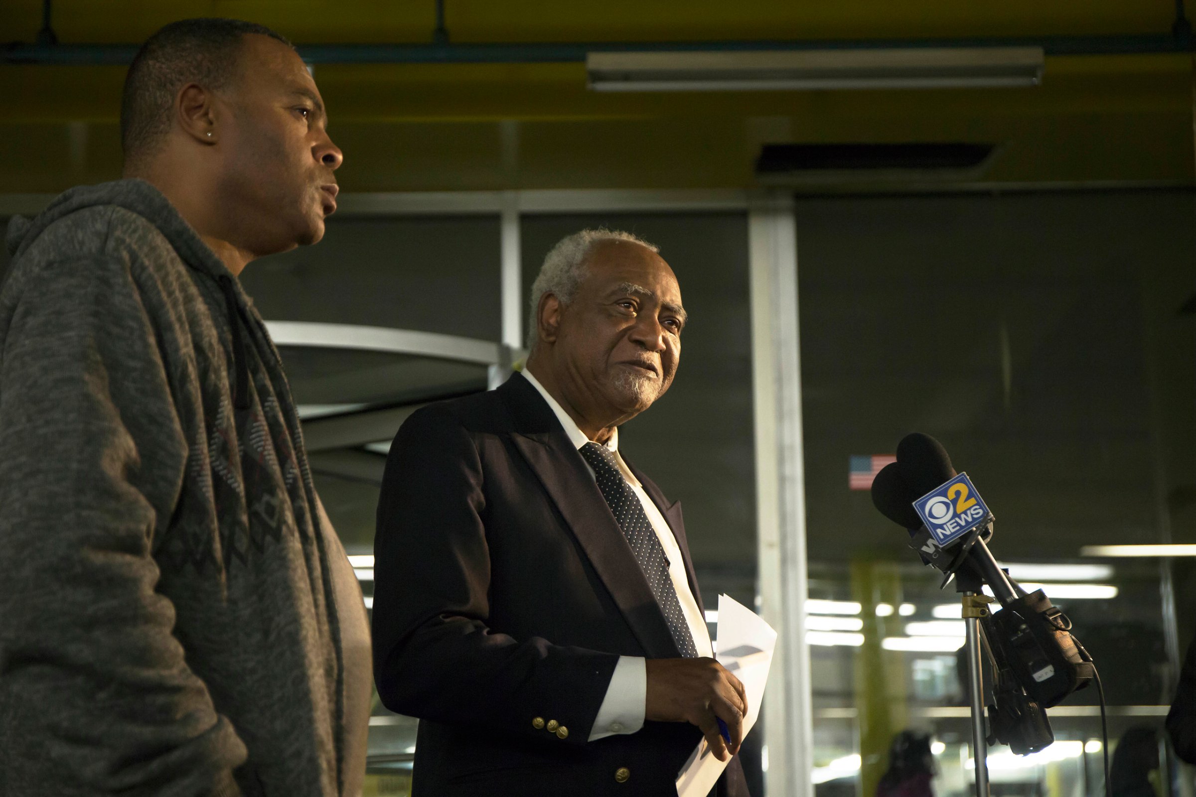 In this Friday, Nov. 18, 2016 photo, U.S. Rep. Danny Davis, D-Ill., center, and his son, Stacey Wilson, give a news conference at the 5th District police department in the Englewood neighborhood of Chicago. Fifteen-year-old Javon Wilson, the grandson of Danny Davis and son of Stacey Wilson, was shot and killed Friday evening. Javon was a sophomore at Perspective high school. (Alyssa Pointer/Chicago Tribune via AP)