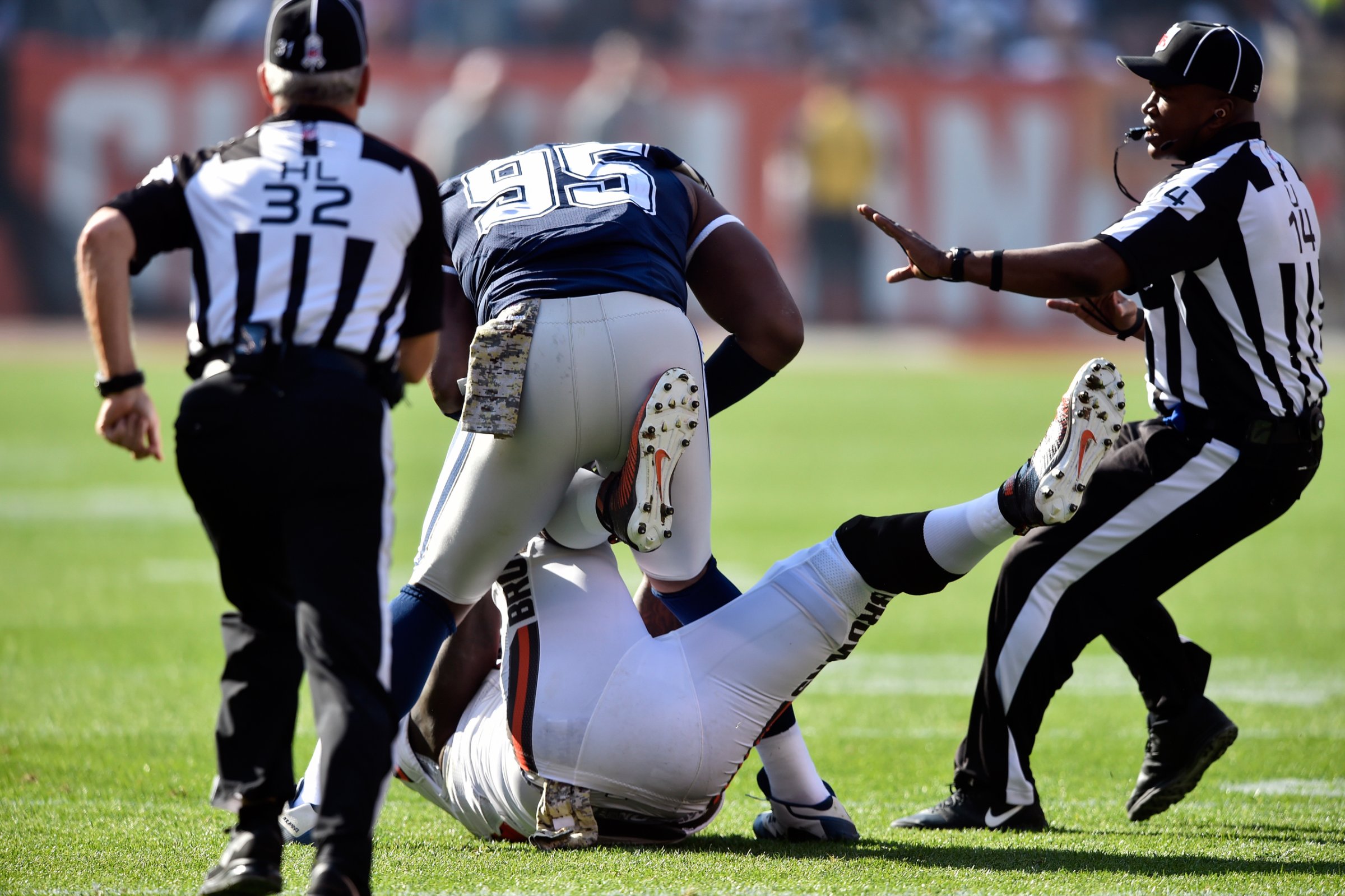 Dallas Cowboys defensive tackle David Irving (95) and Cleveland Browns center Cameron Erving, bottom, fight in the first half of an NFL football game, Sunday, Nov. 6, 2016, in Cleveland. (AP Photo/David Richard)
