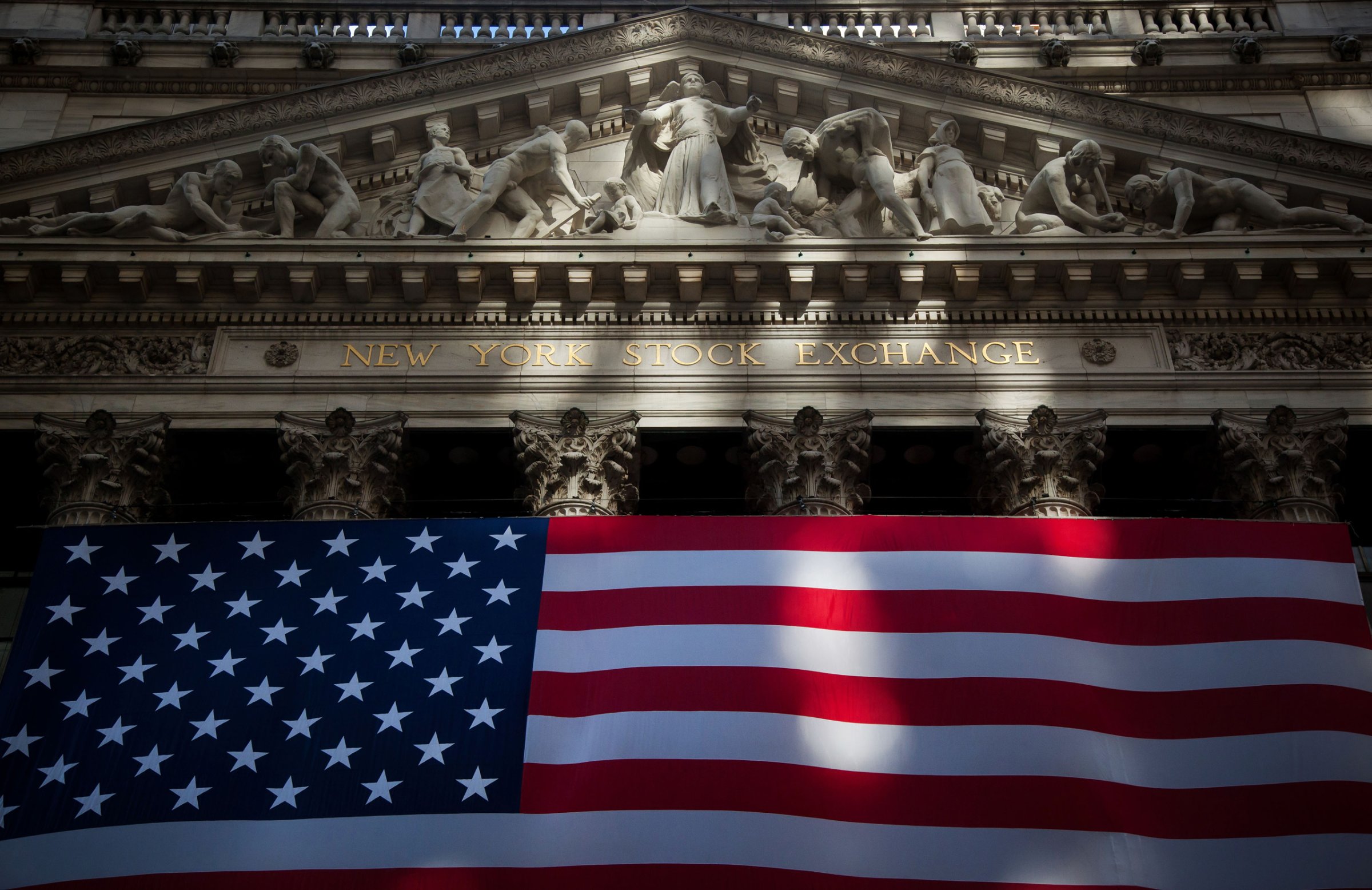 An American flag is displayed at the New York Stock Exchange (NYSE) in New York, U.S., on Nov. 11, 2016.