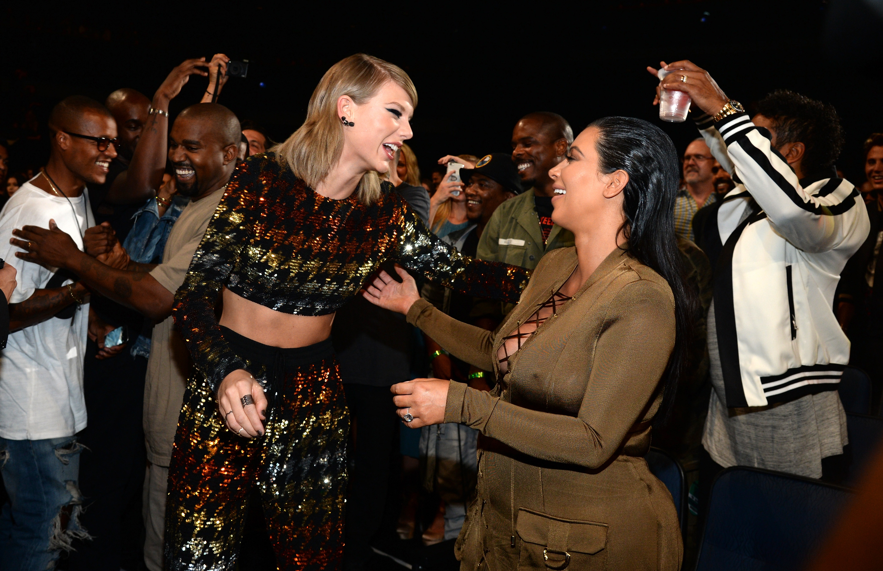 Taylor Swift and Kim Kardashian-West at the 2015 MTV Video Music Awards. (Kevin Mazur—MTV1415/WireImage)