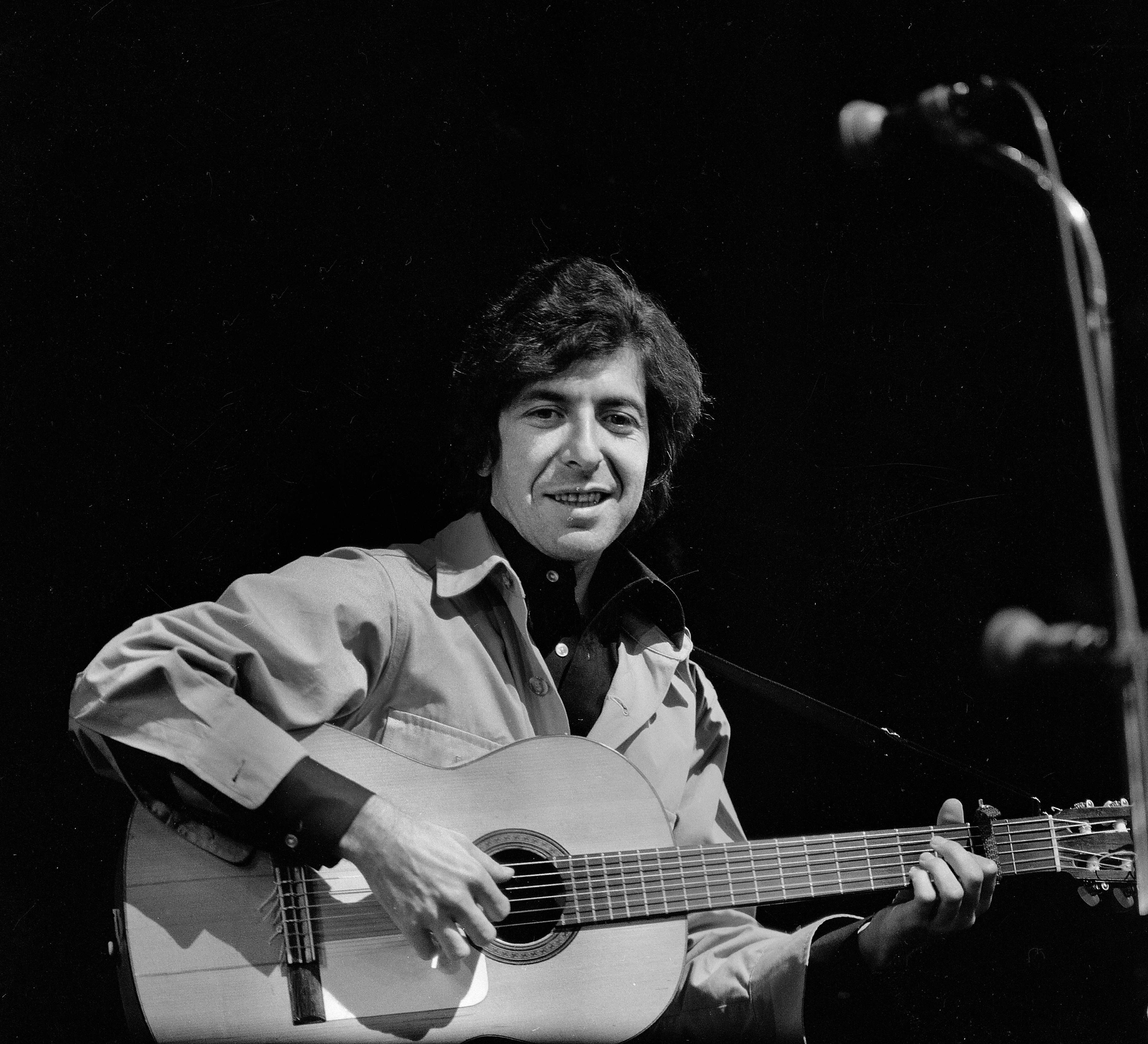 Leonard Cohen, the Canadian singer and writer, in concert. France, 1970. (P. Ullman—Roger Viollet/Getty Images)
