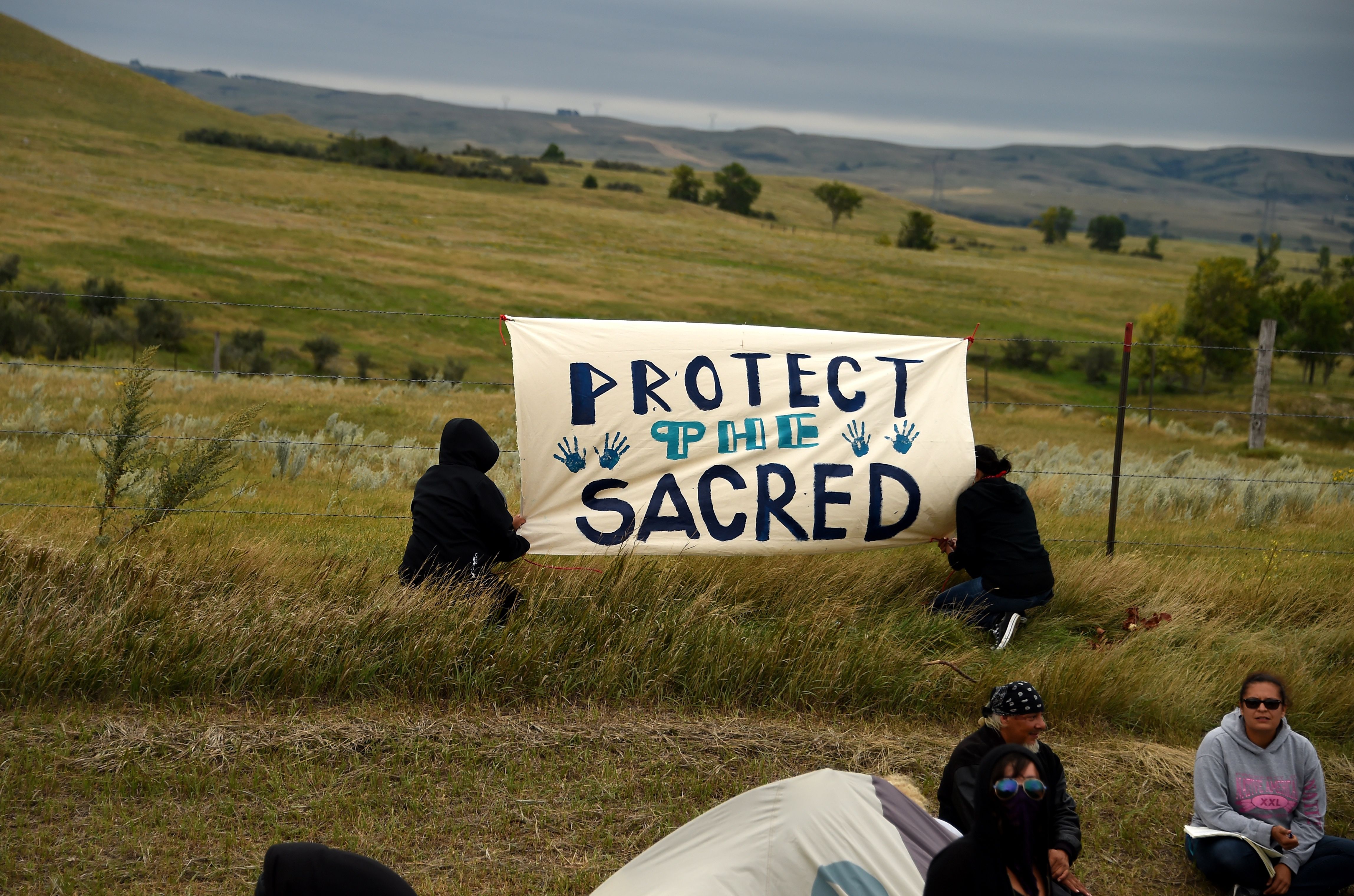 Demonstrators join the Standing Rock Sioux Tribe's protest of the oil pipeline that is slated to cross the Missouri River nearby, Sept. 4, 2016 near Cannon Ball, North Dakota. (Robyn Beck—AFP/Getty Images)