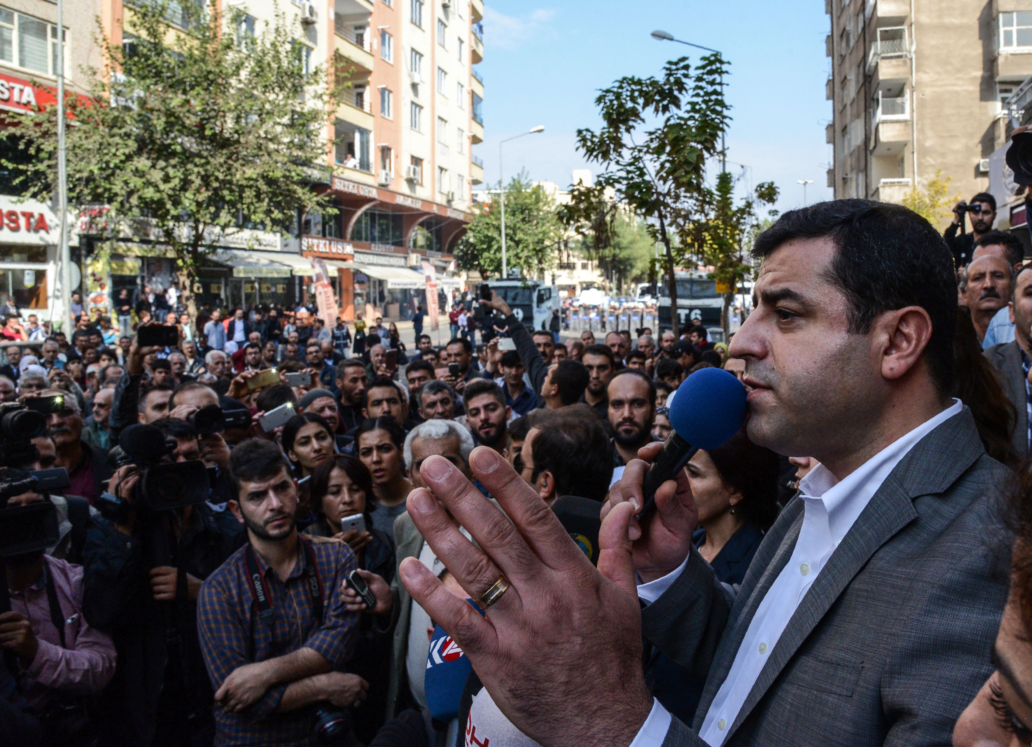Selahattin Demirtas, Co-leader of the pro-Kurdish Peoples Democracy Party (HDP), addresses participants of a pro-Kurdish demonstration in front of the municipality headquarters in Diyarbakir, southeastern Turkey, Oct. 30, 2016. (Ilyas Akengin—AFP/Getty Images)