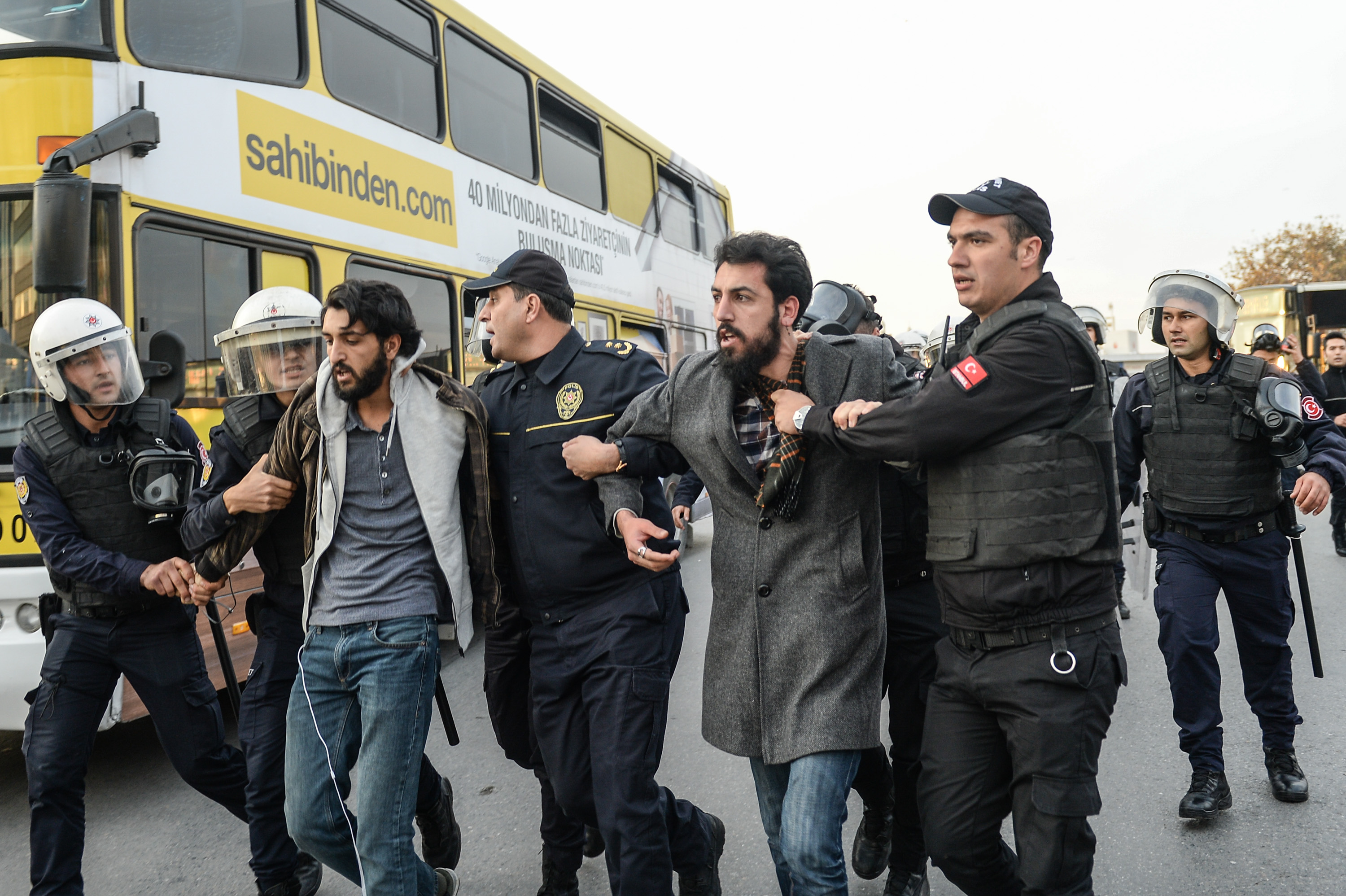 Turkish antiriot police officers detain  protesters in Istanbul on Nov. 6, 2016, during a demonstration against the arrest of nine  MPs of the pro-Kurdish People's Democratic Party (Yasin Akgul—AFP/Getty Images)