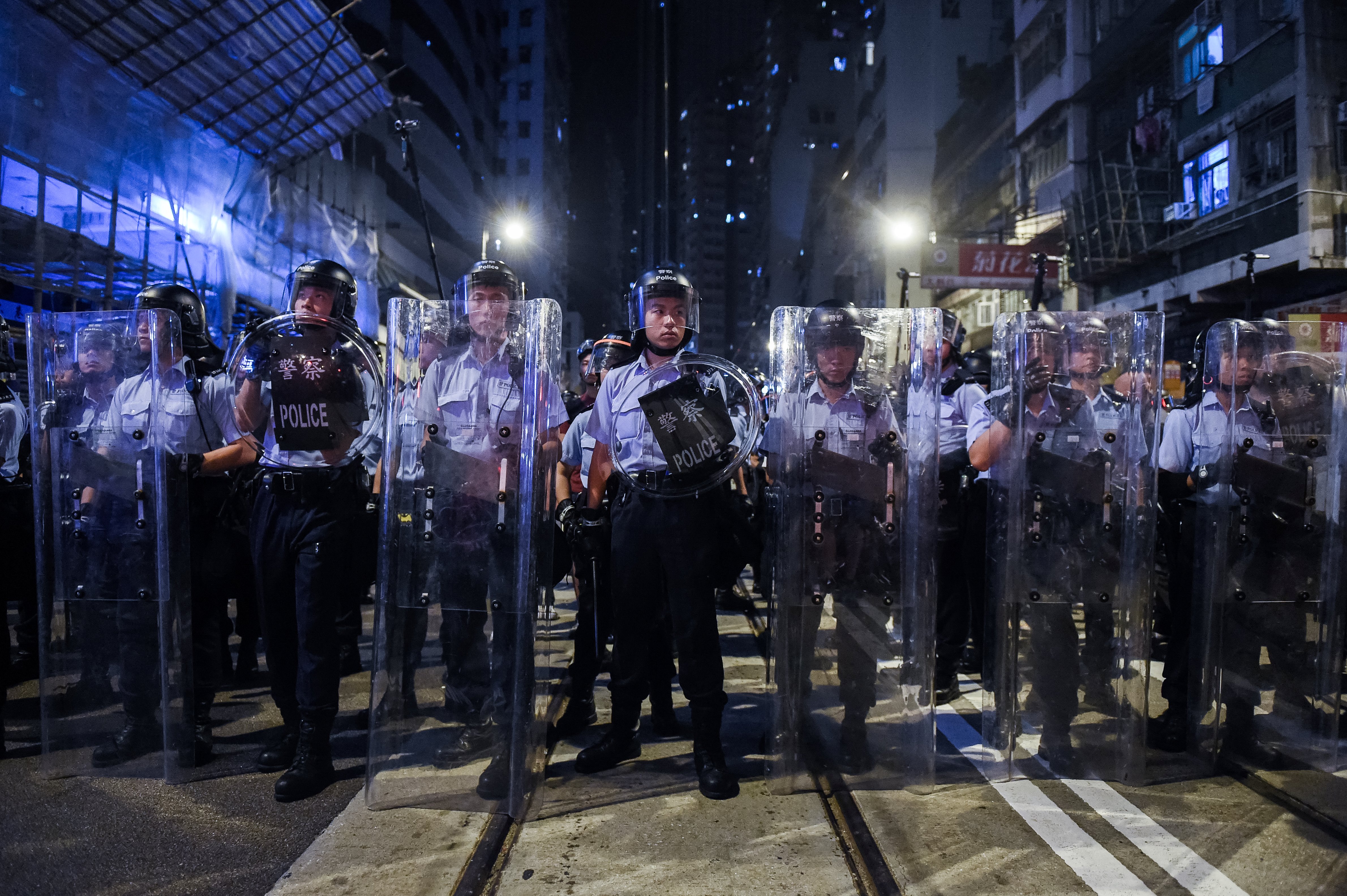 Riot police stand guard during a protest in Hong Kong early on Nov. 7, 2016 (Anthony Wallace—AFP/Getty Images)