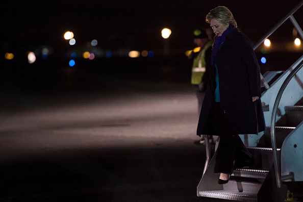 Democratic presidential nominee Hillary Clinton arrives at Manchester-Boston Regional Airport on Nov. 6, 2016, in Manchester, N.H. (Brendan Smialowski—AFP/Getty Images)