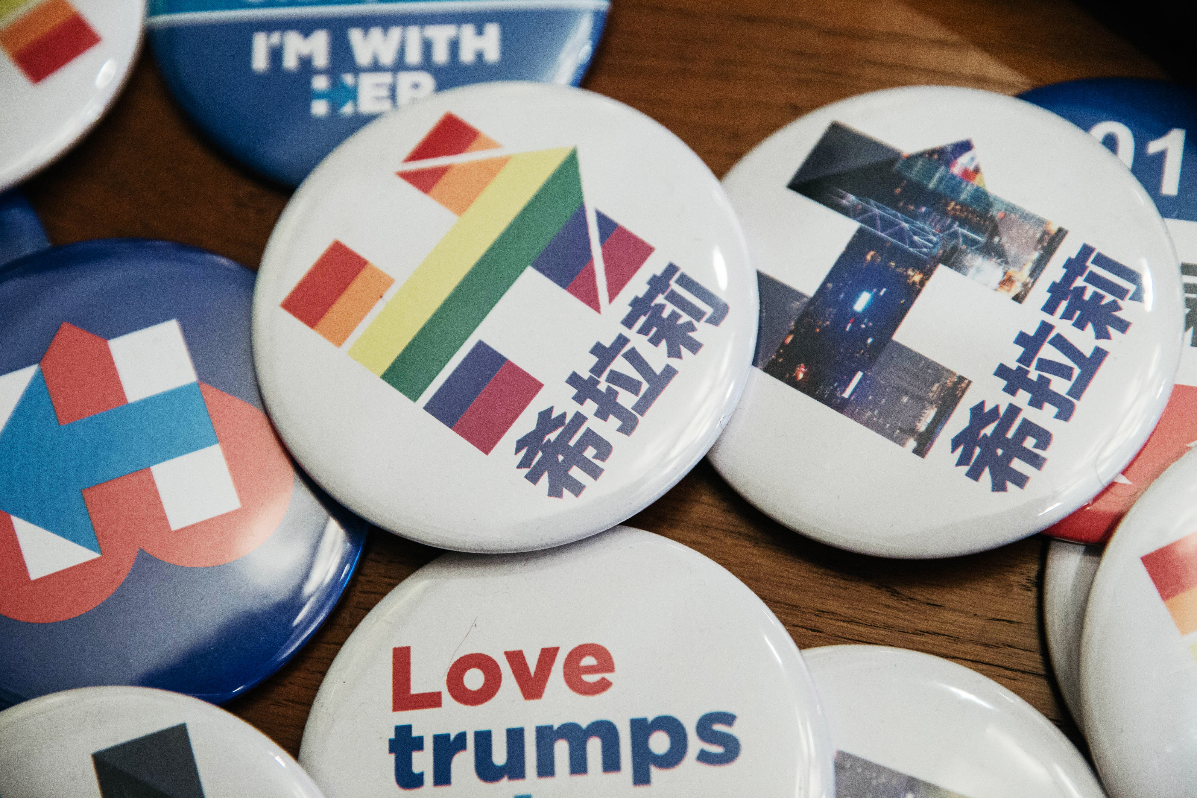 Buttons in support of Hillary Clinton, 2016 Democratic presidential nominee, sit at an election-watch party organized by Democrats Abroad in Hong Kong on Nov. 9, 2016 (Bloomberg/Getty Images)