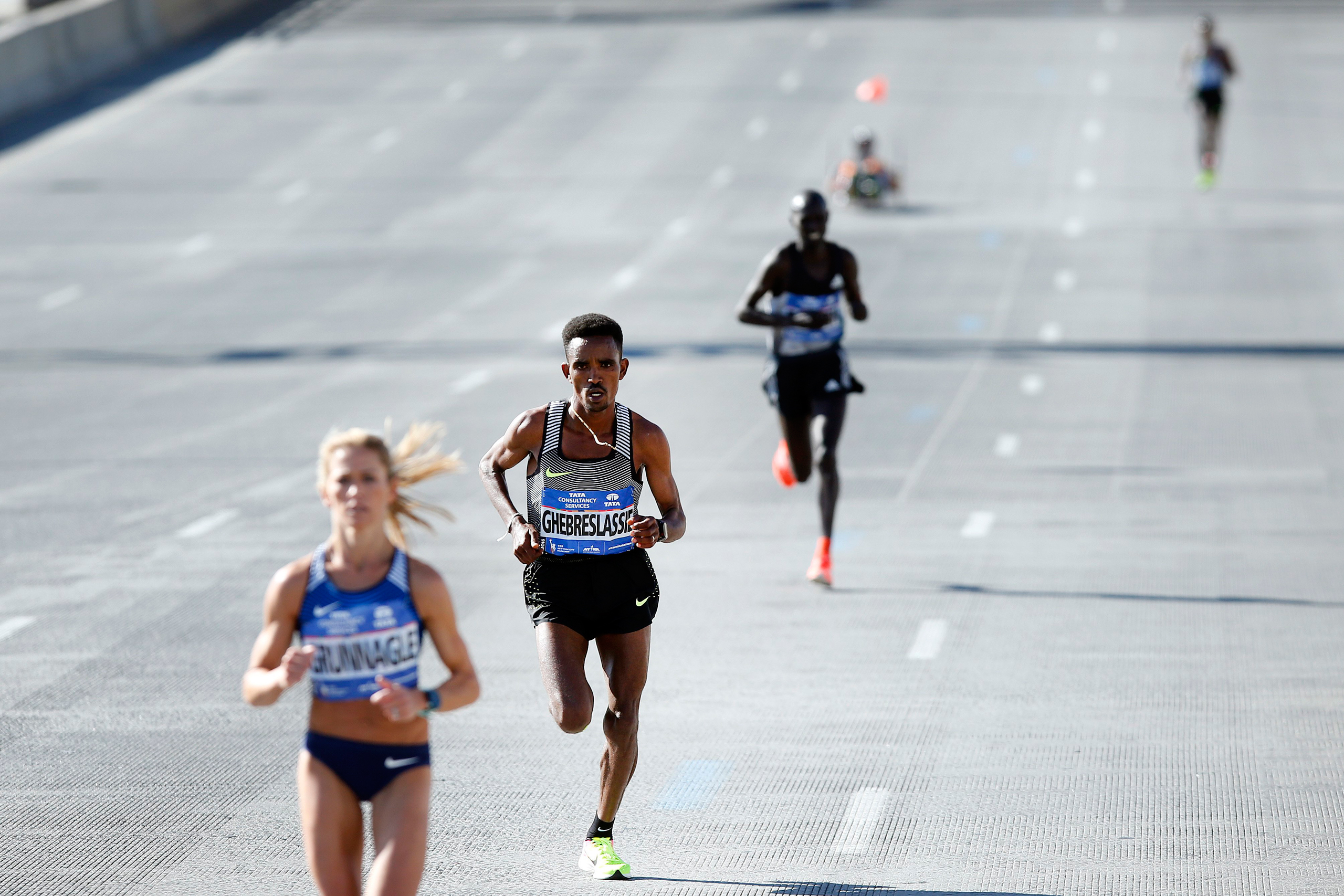 Ghirmay Ghebreslassie of Eritrea, second left, pulls away from Kenya's Lucas Rotich, second right, during the New York City Marathon on Nov. 6, 2016. (Jason DeCrow—AP)