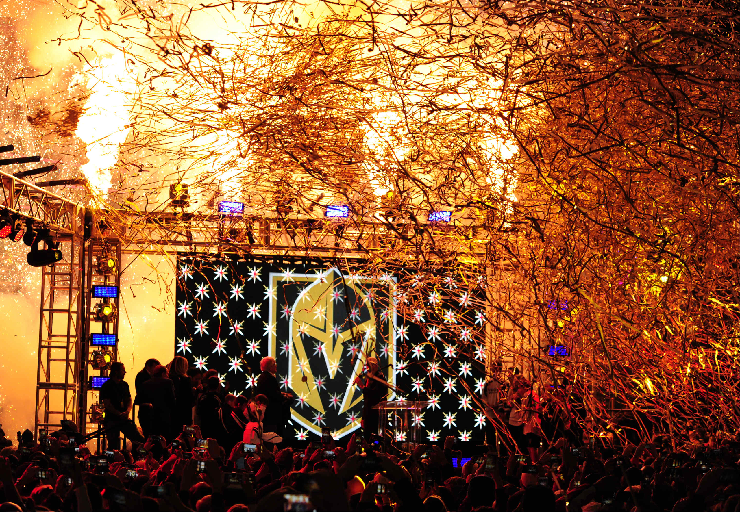 Pyrotechnics explode as the Vegas Golden Knights name and logo is revealed during the Las Vegas NHL team name Unveiling ceremony at T-Mobile Arena in Las Vegas, NV on Nov. 22, 2016. (Josh Holmberg—AP)