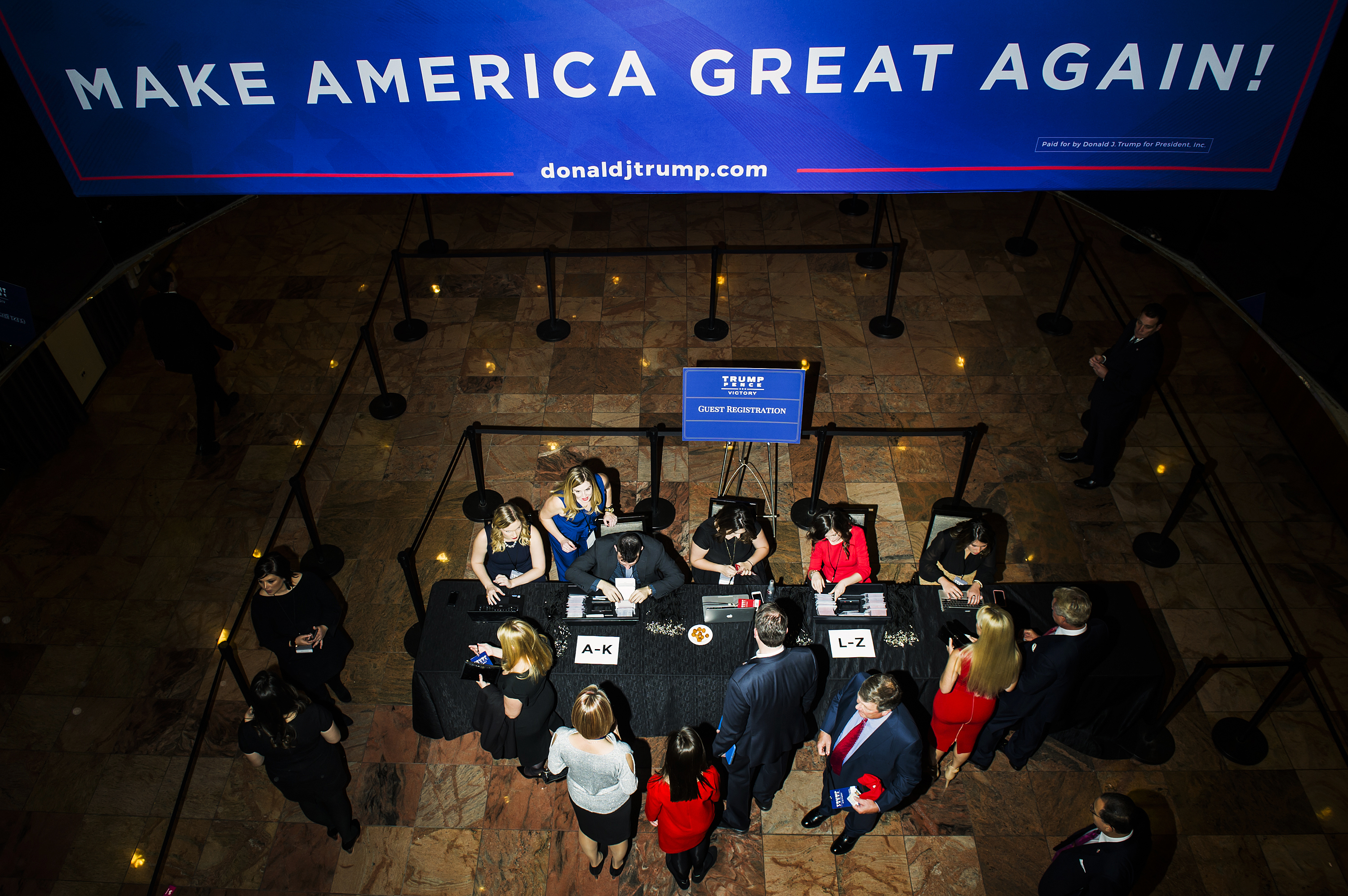 Guest register for an election party for Republican presidential candidate Donald Trump, Tuesday, Nov. 8, 2016 in New York's Manhattan borough. Trump faces Democratic nominee Hillary Clinton in the contest for president of the United States.