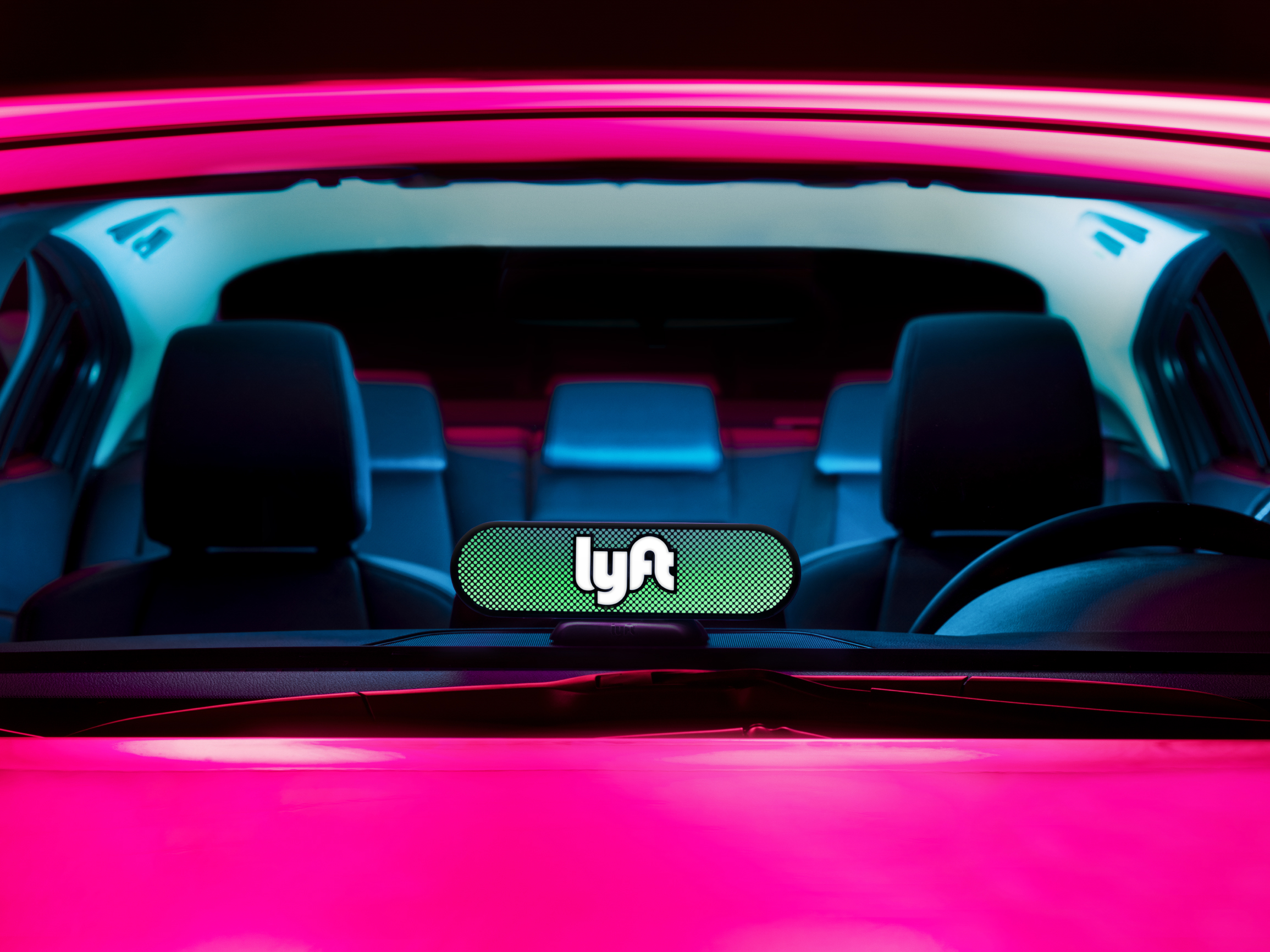 This photograph shows the view of the Amp device that passengers will have from outside the car. Personalized lighting displays will be used to help passengers and drivers connect on the street. (Courtesy of Lyft)