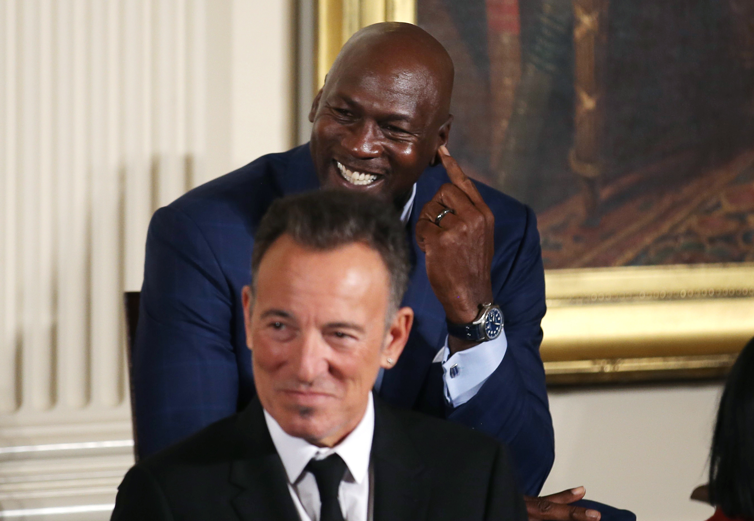 NBA star Michael Jordan and musician Bruce Springsteen attend the Presidential Medal of Freedom awards in the East Room of the White House in Washington, on Nov. 22, 2016. (Carlos Barria—Reuters)