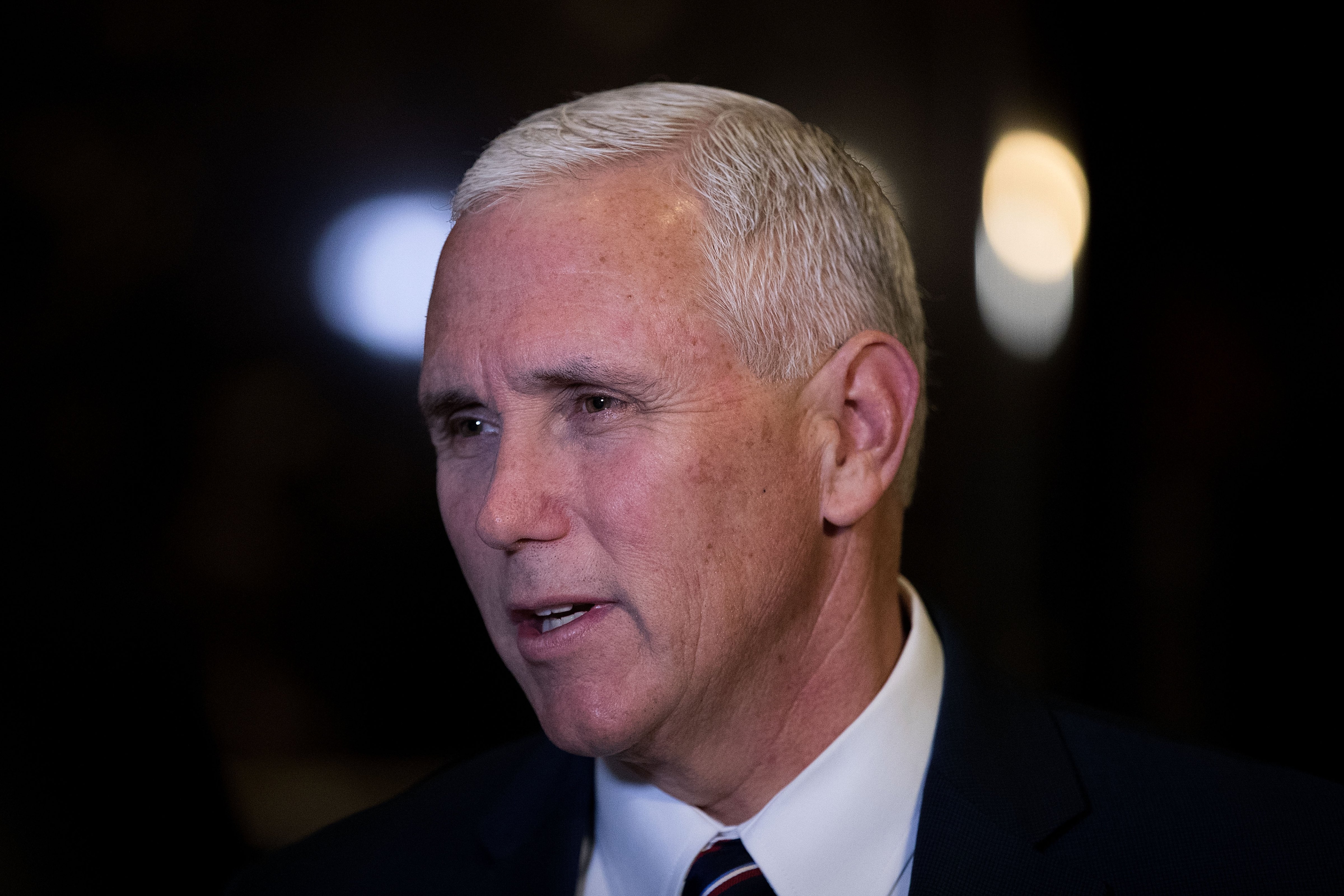 Vice President-elect Mike Pence stops and speaks briefly to reporters at Trump Tower in New York City on Nov. 18, 2016. (Drew Angerer—Getty Images)