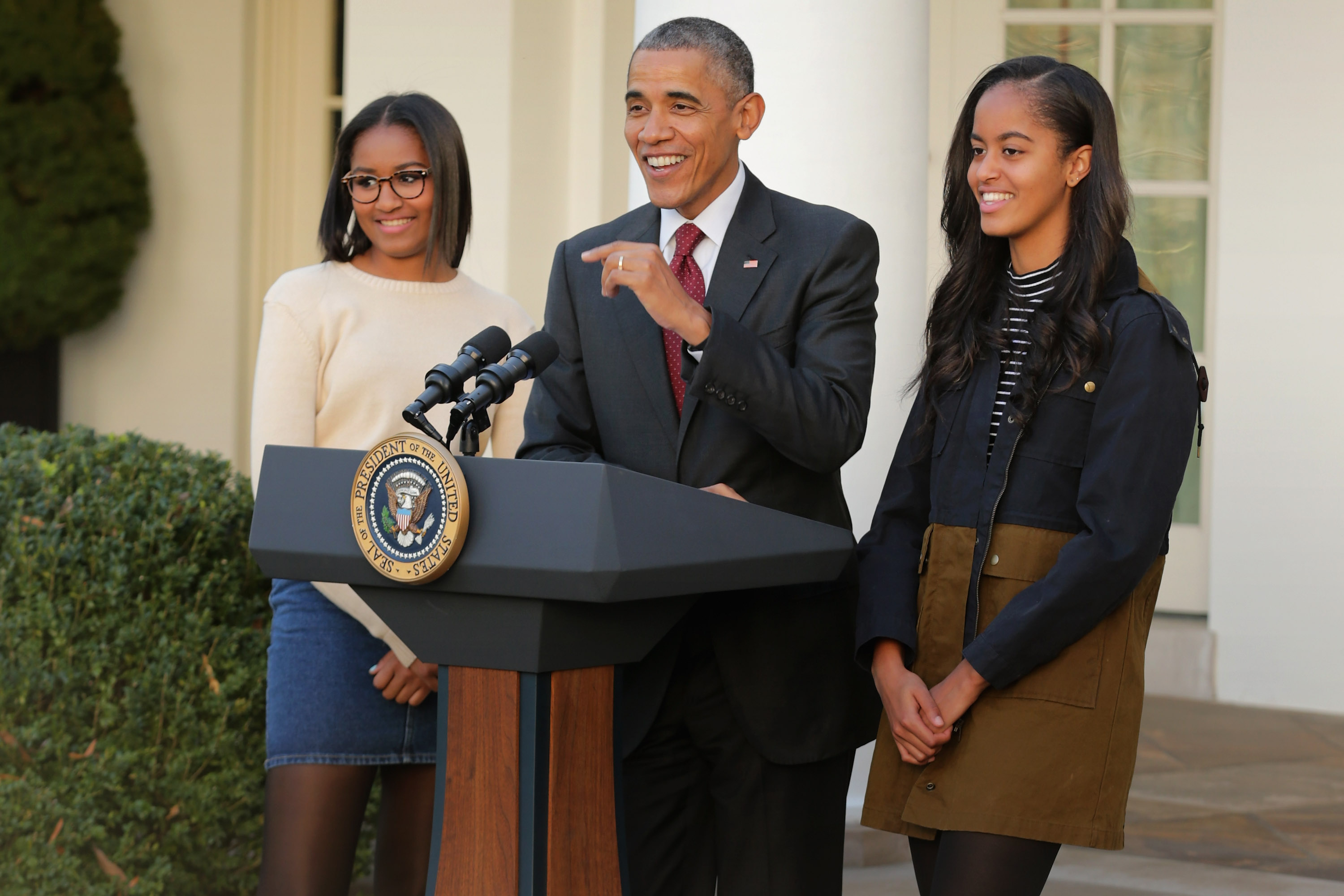 WASHINGTON, DC - NOVEMBER 25:  U.S. President Barack Obama delivers remarks with his daughters Sasha (L) and Malia during the annual turkey pardoning ceremony in the Rose Garden at the White House  November 25, 2015 in Washington, DC. In a tradition dating back to 1947, the president pardons a turkey, sparing the tom -- and his alternate -- from becoming a Thanksgiving Day feast. This year, Americans were asked to choose which of two turkeys would be pardoned and to cast their votes on Twitter.  (Photo by Chip Somodevilla/Getty Images) (Chip Somodevilla/Getty Images)