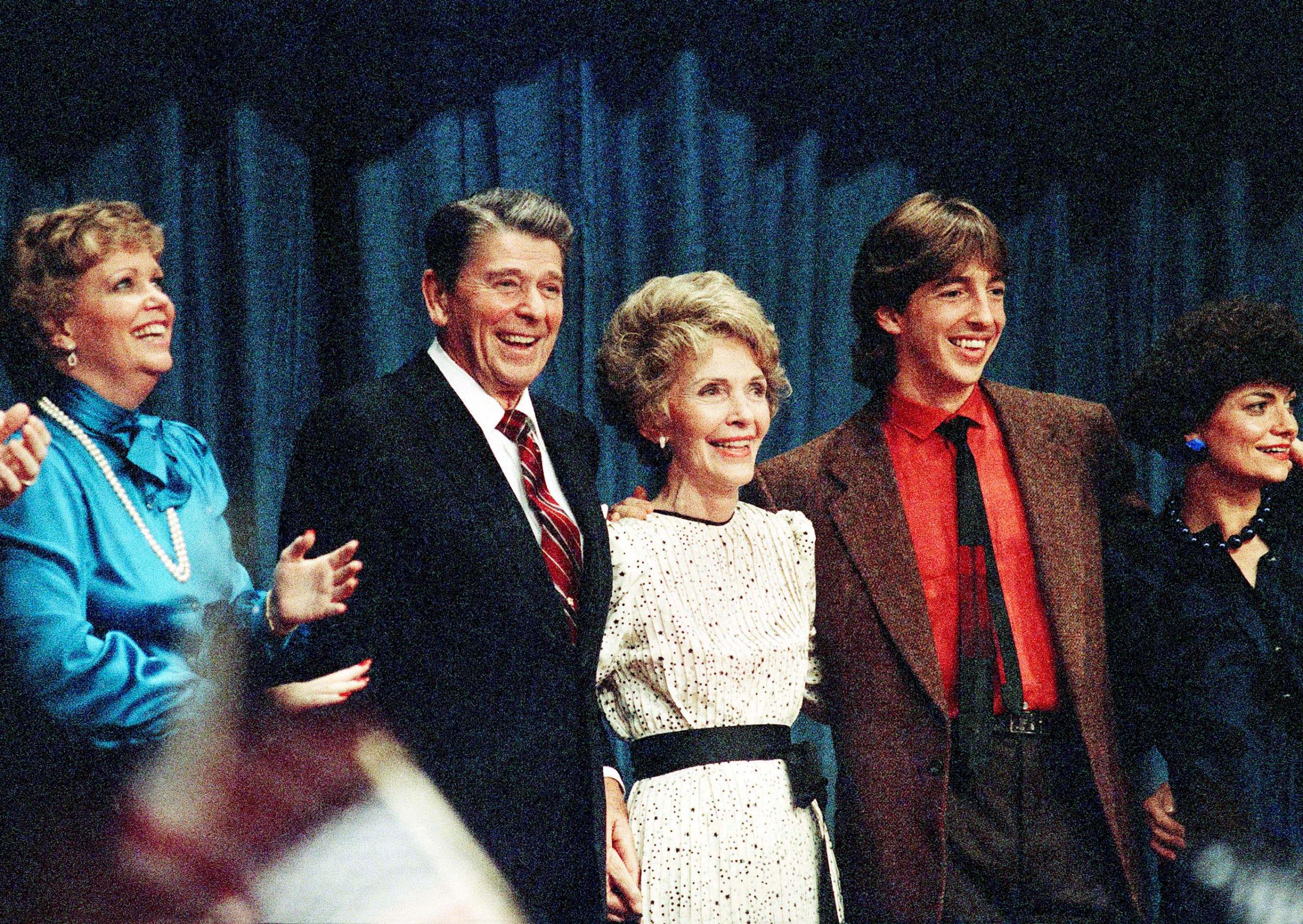 The Reagan's smile and gather together during Ronald Reagan's Victory, on Nov. 6, 1984.