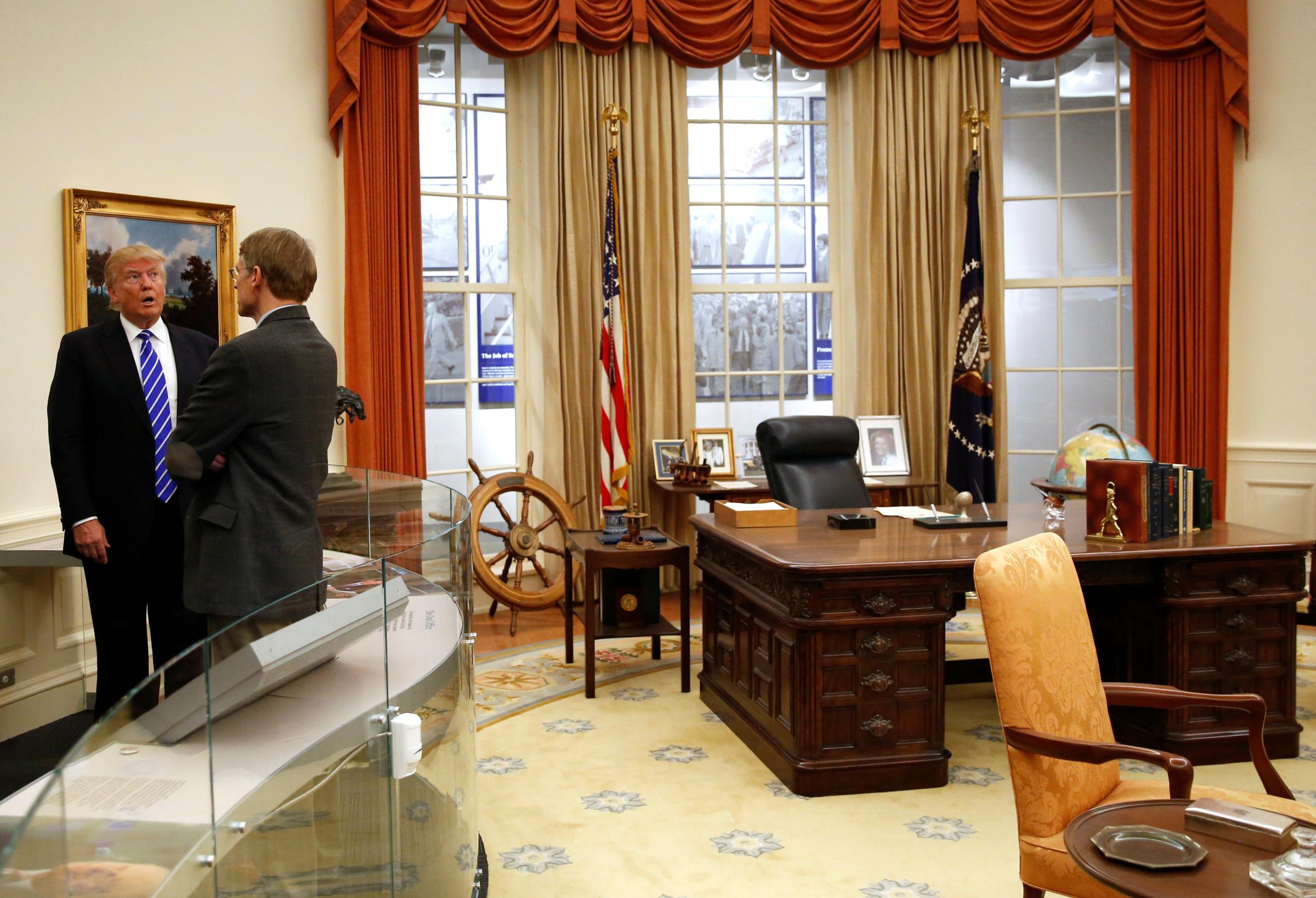Trump views a replica of the Oval Office on a tour of the Ford Presidential Museum in Grand Rapids, Michigan, U.S.