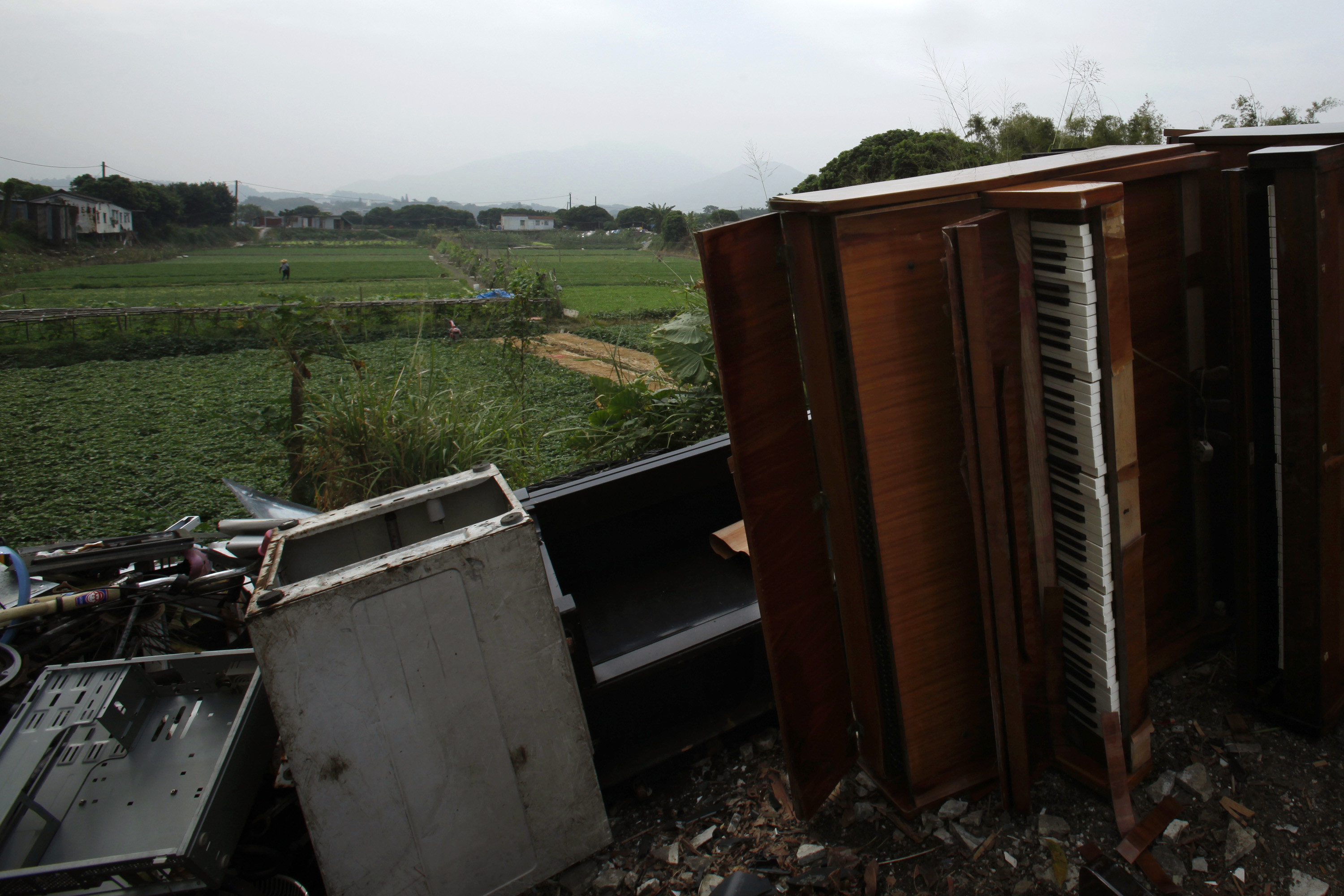Unwanted items are dumped near farms in Hong Kong's New Territories on Nov. 6, 2013 (Bobby Yip—Reuters)