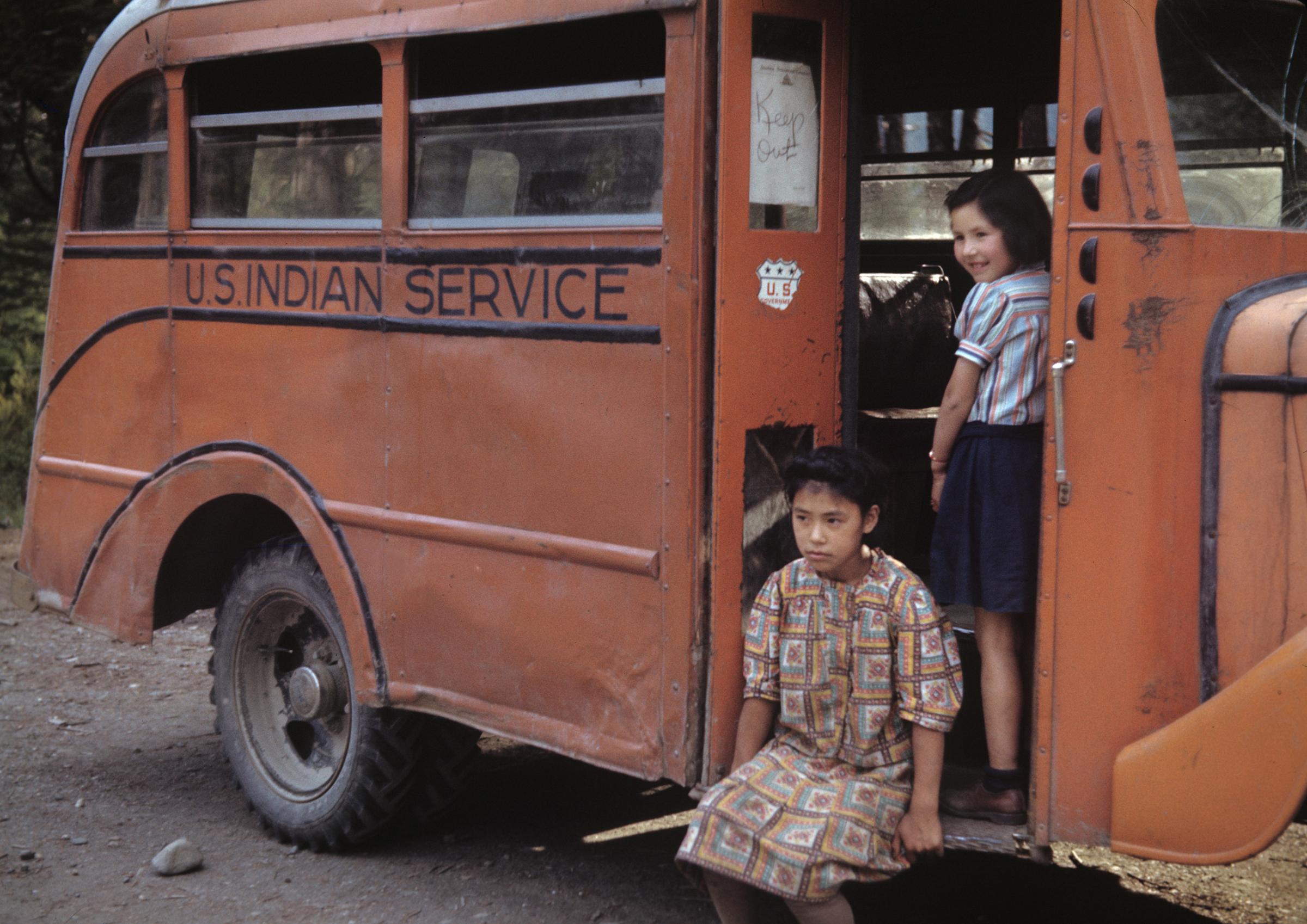 Students waiting on a U.S. Indian Service school bus, Ward Cove, Alaska Territory, 1941–43 by Ruth Gruber