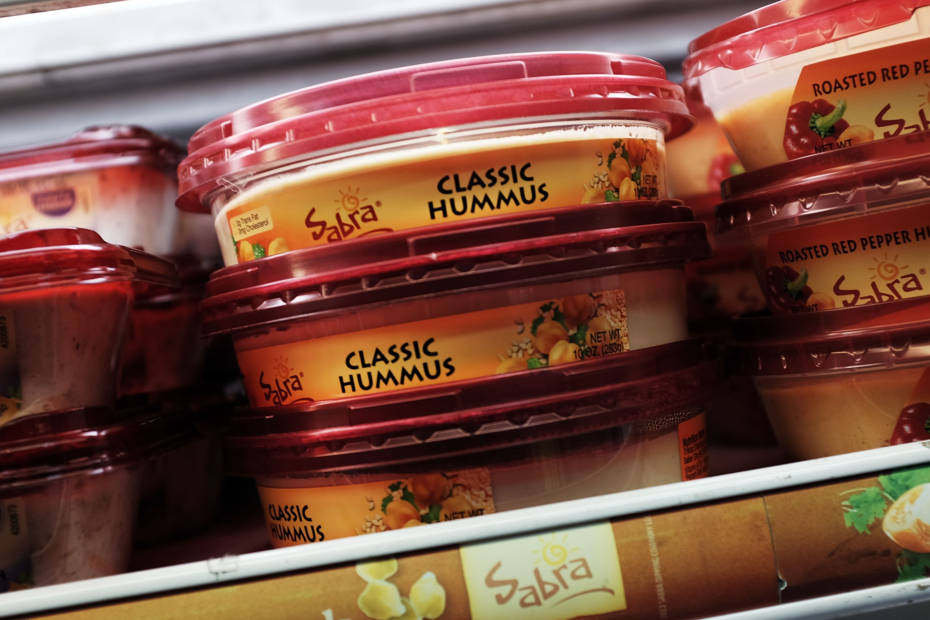 Cases of Sabra Classic Hummus are viewed on the shelf of a grocery store on April 9, 2015 in New York City.