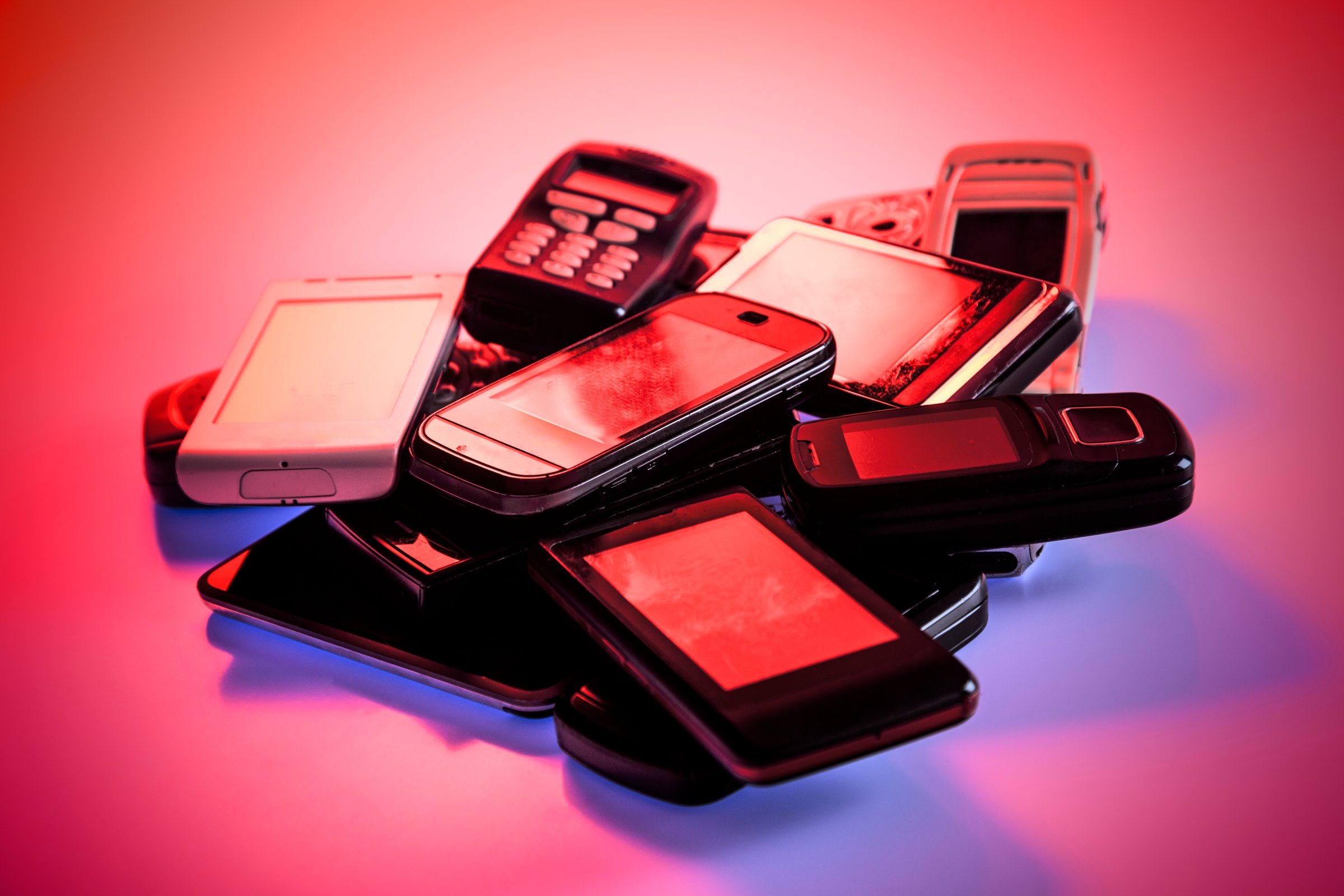 Old used cellphones pile