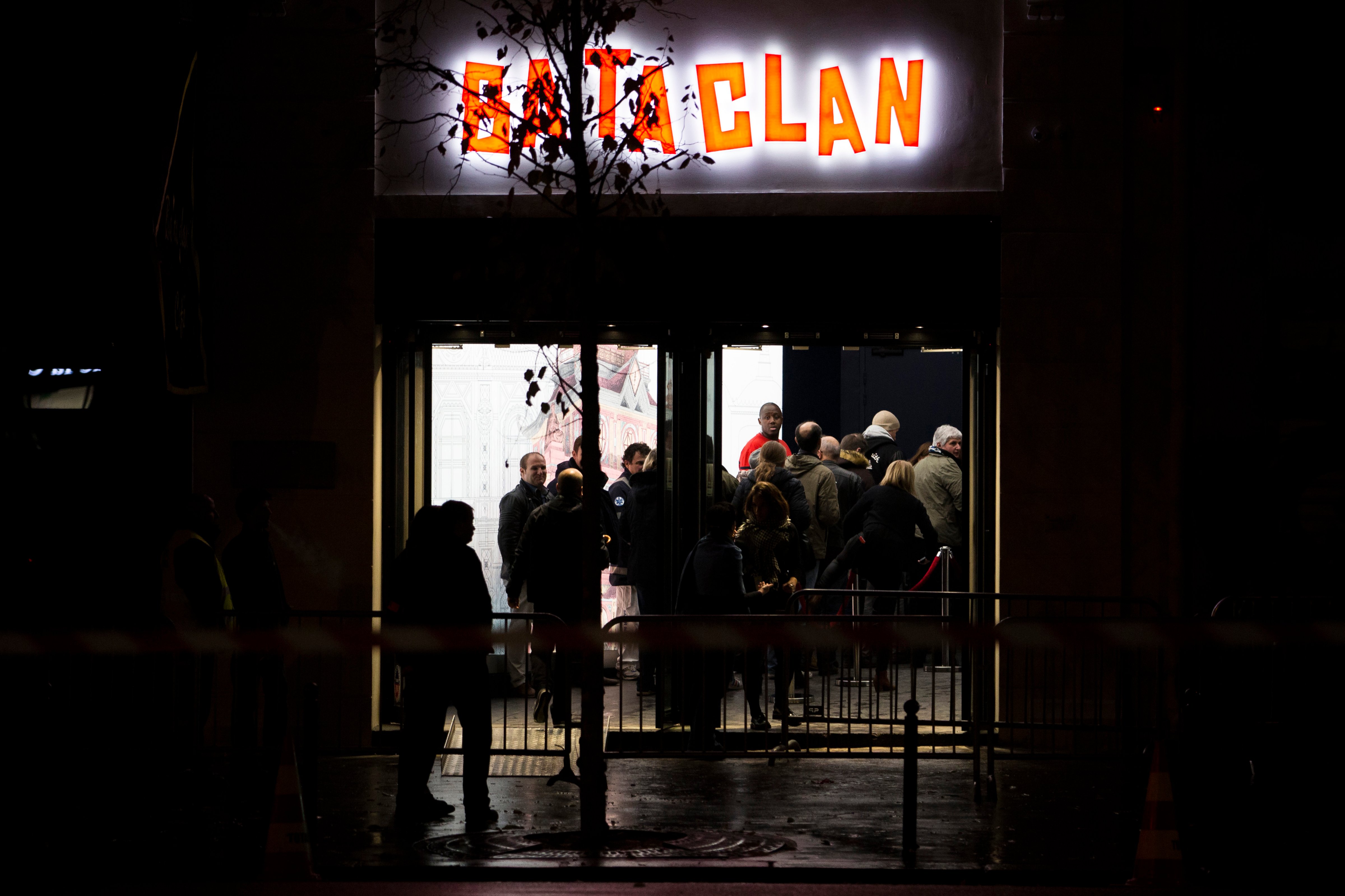 People enter the Bataclan concert hall in Paris, on Nov. 12, 2016. A concert by British pop legend Sting is marking the reopening of the Paris' Bataclan. (Kamil Zihnioglu—AP)