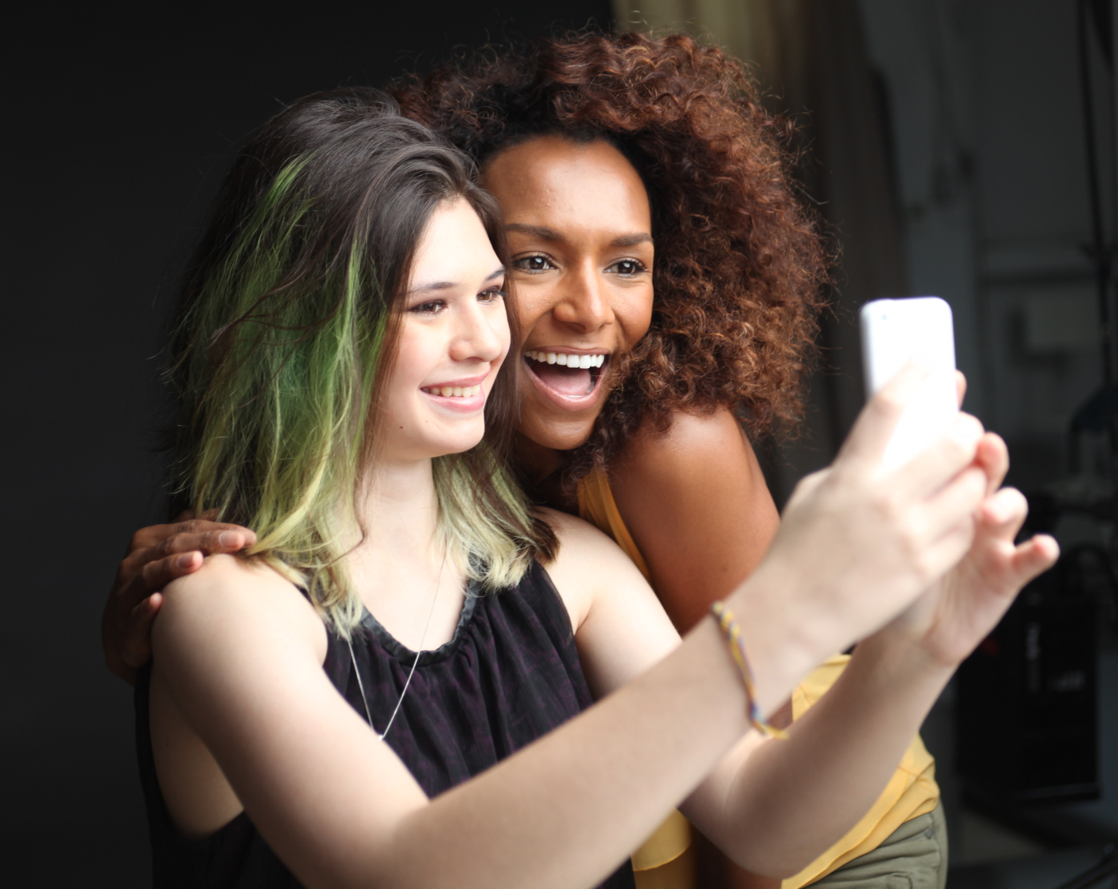 Nicole Maines, whose family won a case in the Supreme Court of Maine over bathroom use, takes a selfie with Mock on the set of The Trans List. (Timothy Greenfield-Sanders / Courtesy of HBO)