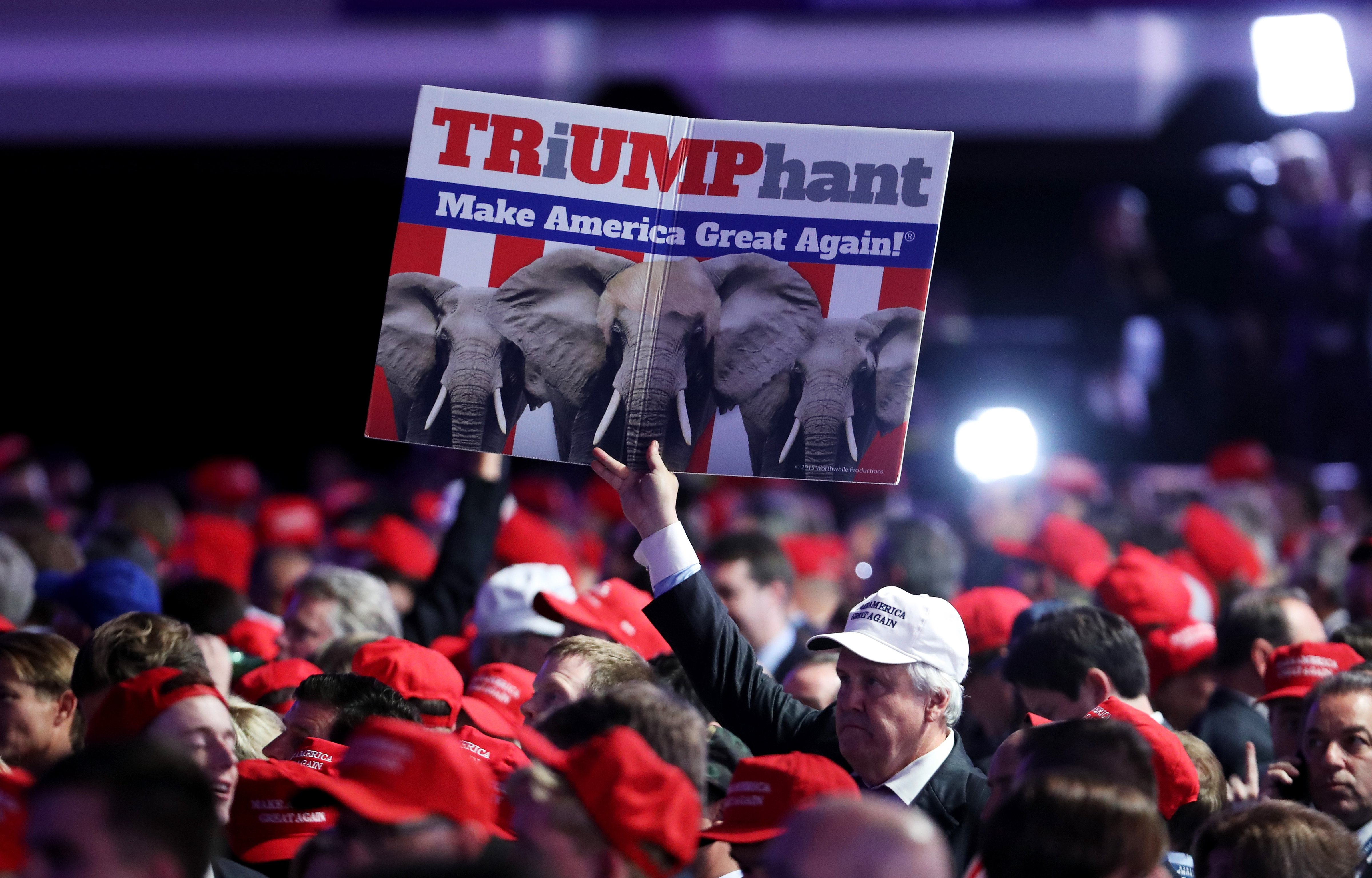 A supporter holds up a sign in support of Republican presidential nominee Donald Trump during the election night event at the New York Hilton Midtown on Nov. 8, 2016. (Spencer Platt—Getty Images)