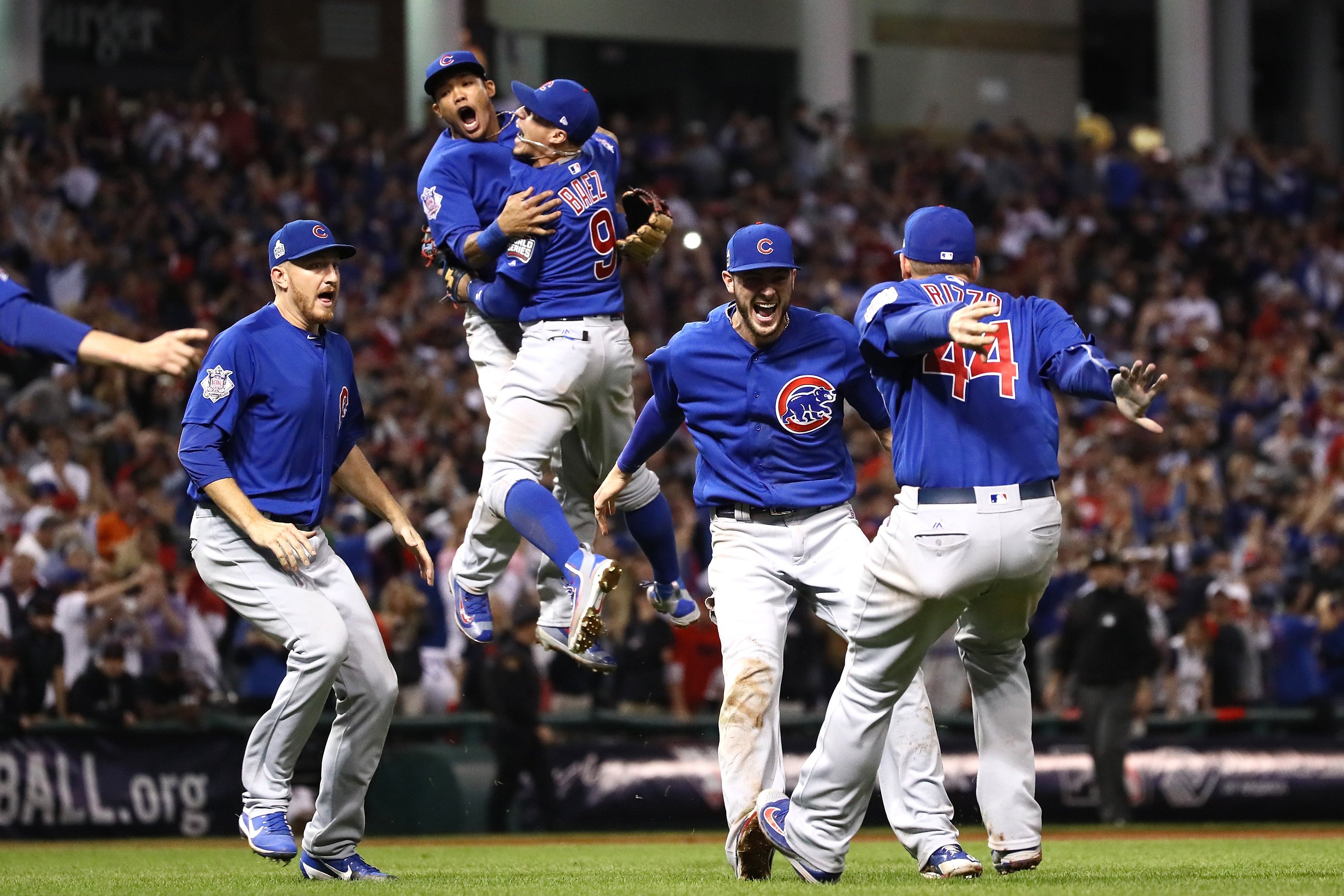The Chicago Cubs celebrate after defeating the Cleveland Indians  8-7 in Game 7 to win baseball's 2016 World Series at Progressive Field on Nov. 3, 2016 in Cleveland. (Ezra Shaw—Getty Images)