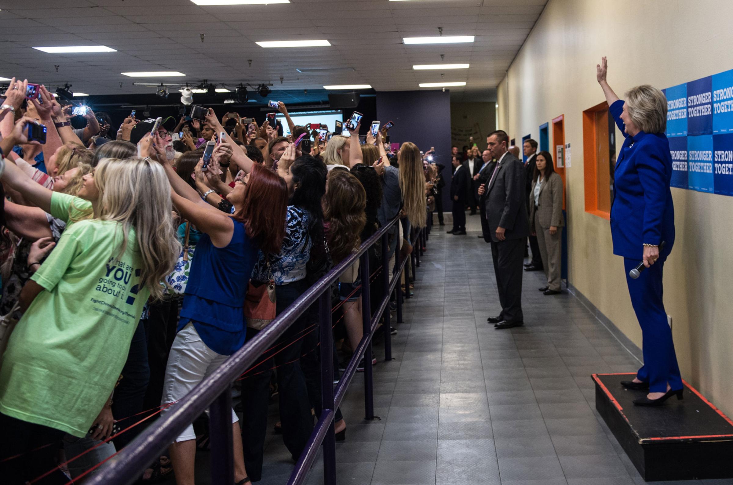 Hillary Clinton poses for selfies at an Orlando, Fla., event on Sept, 21, 2016.