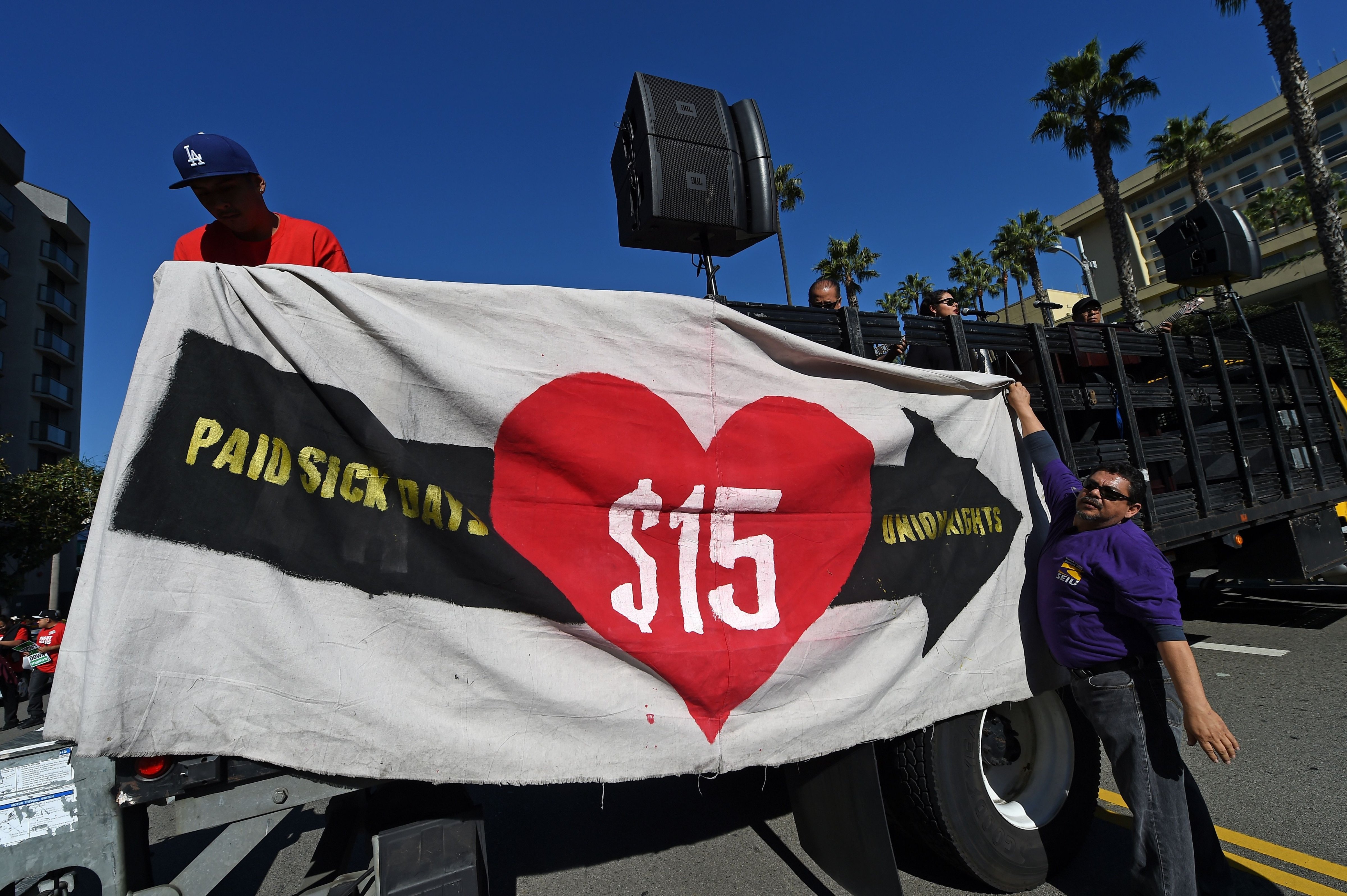 Union workers and supporters participate in a "Fight for $15" wage protest at Los Angeles International Airport in Los Angeles, California, November 29, 2016. (Robyn Beck—AFP/Getty Images)