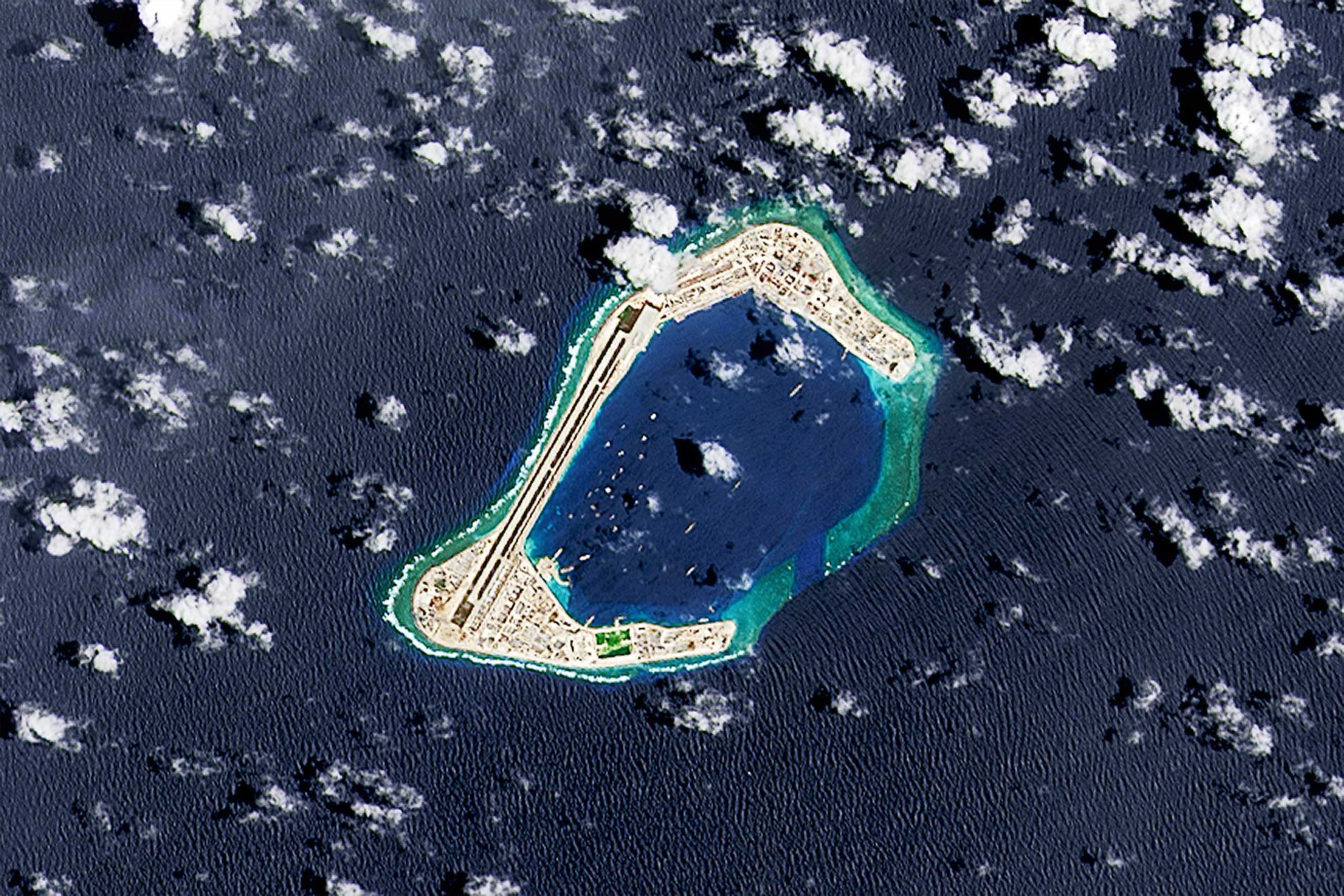 A satellite image of Subi Reef, where an artificial island is being developed by Beijing in the South China Sea. (NASA/Getty Images)