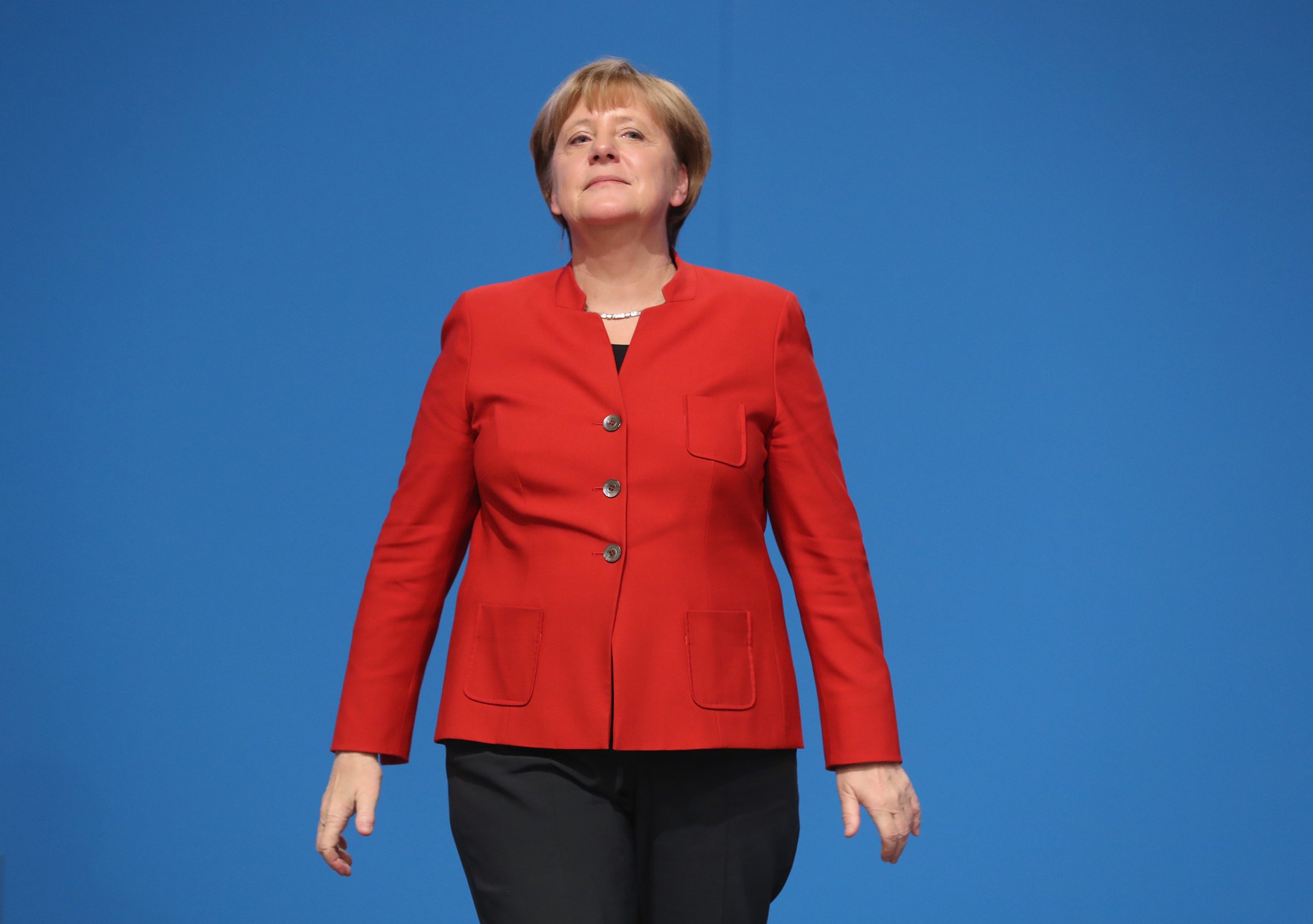 German Chancellor and Chairwoman of the German Christian Democrats Angela Merkel prepares to wave to applauding delegates after she gave her central speech at the 29th federal congress of the CDU in Essen, Germany, on Dec. 6, 2016.