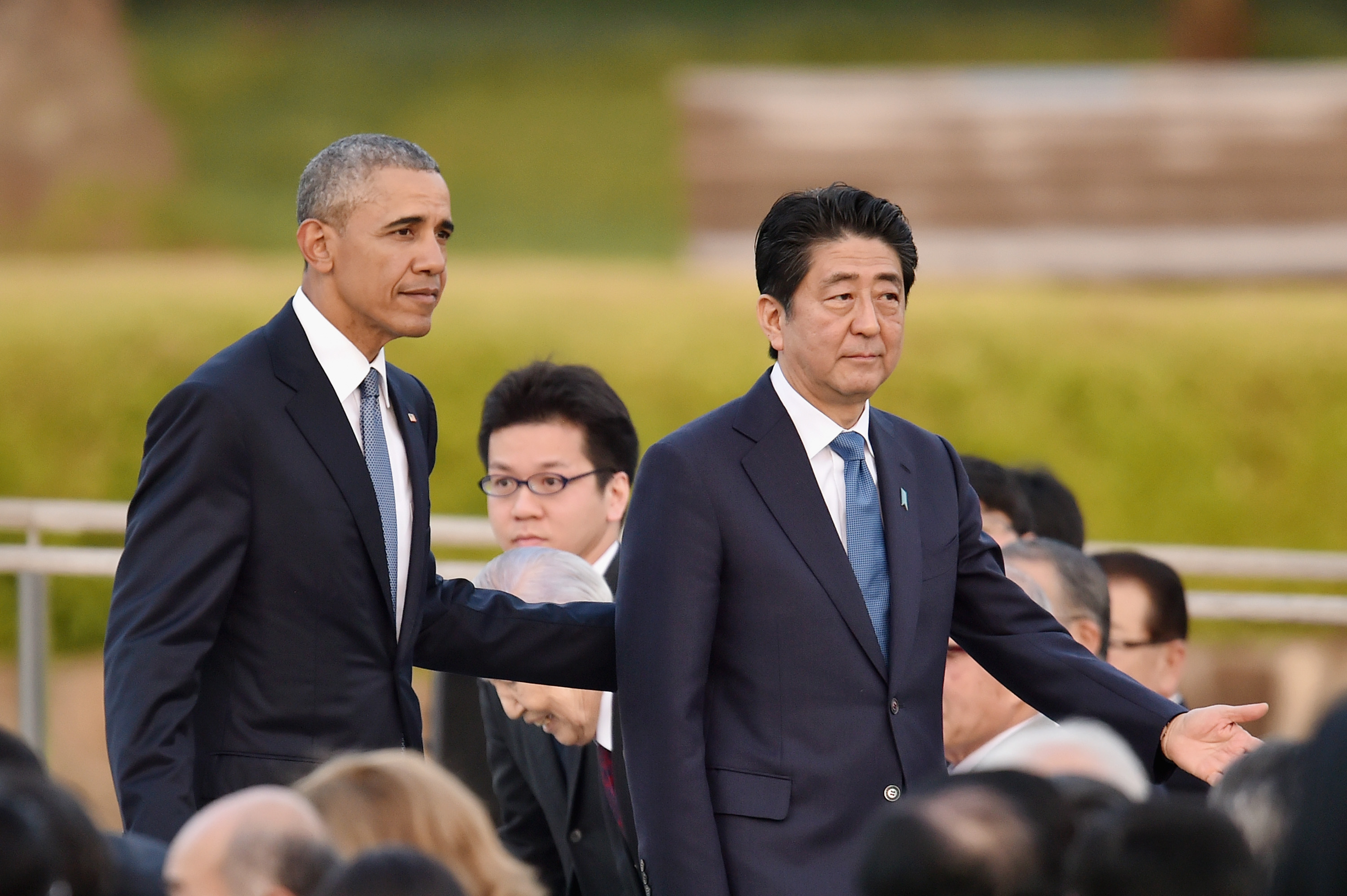 U.S. President Barack Obama and Japanese Prime Minister Shinzo Abe visit the Hiroshima Peace Memorial Park on May 27, 2016 in Hiroshima, Japan. (Atsushi Tomura—Getty Images)