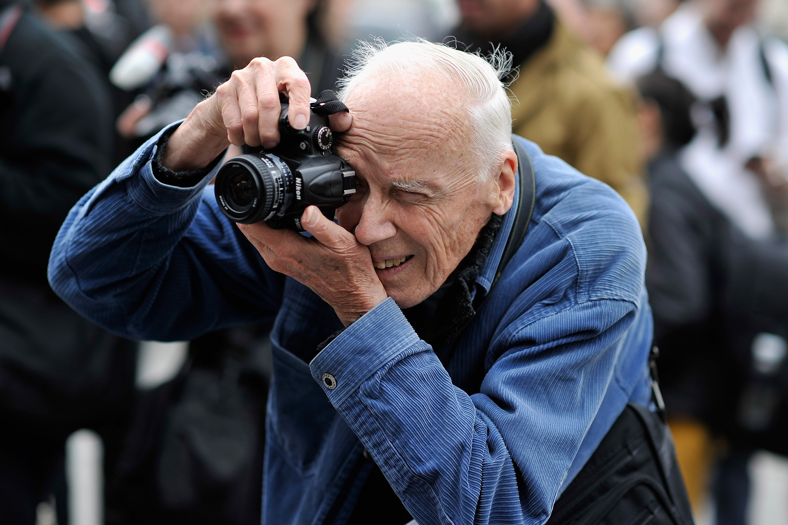 Photographer Bill Cunningham working during Paris Fashion Week Womenswear Spring/Summer 2014 on October 1, 2013 in Paris, France. (Gareth Cattermole—Getty Images)